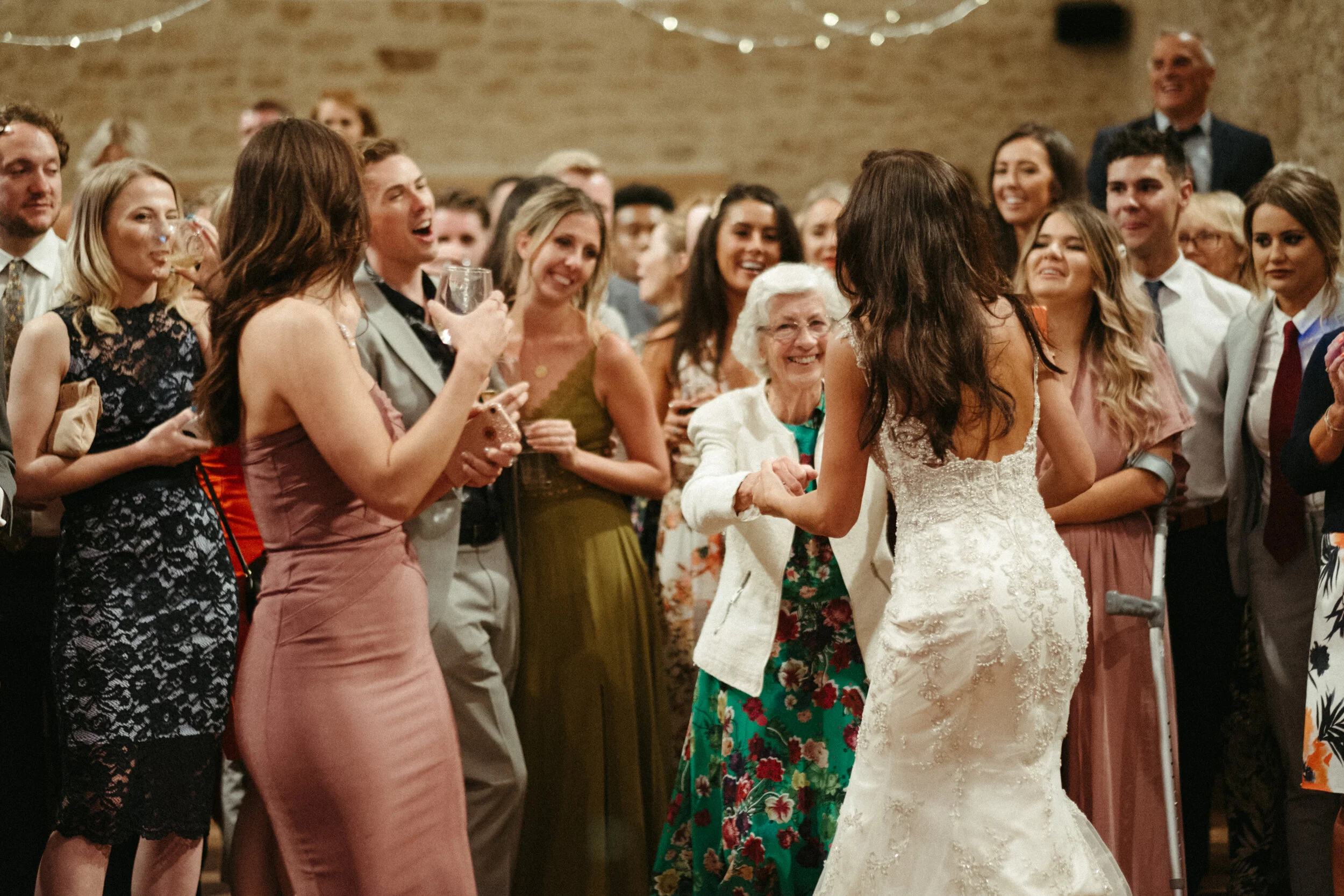 Bride dancing with grandmother 