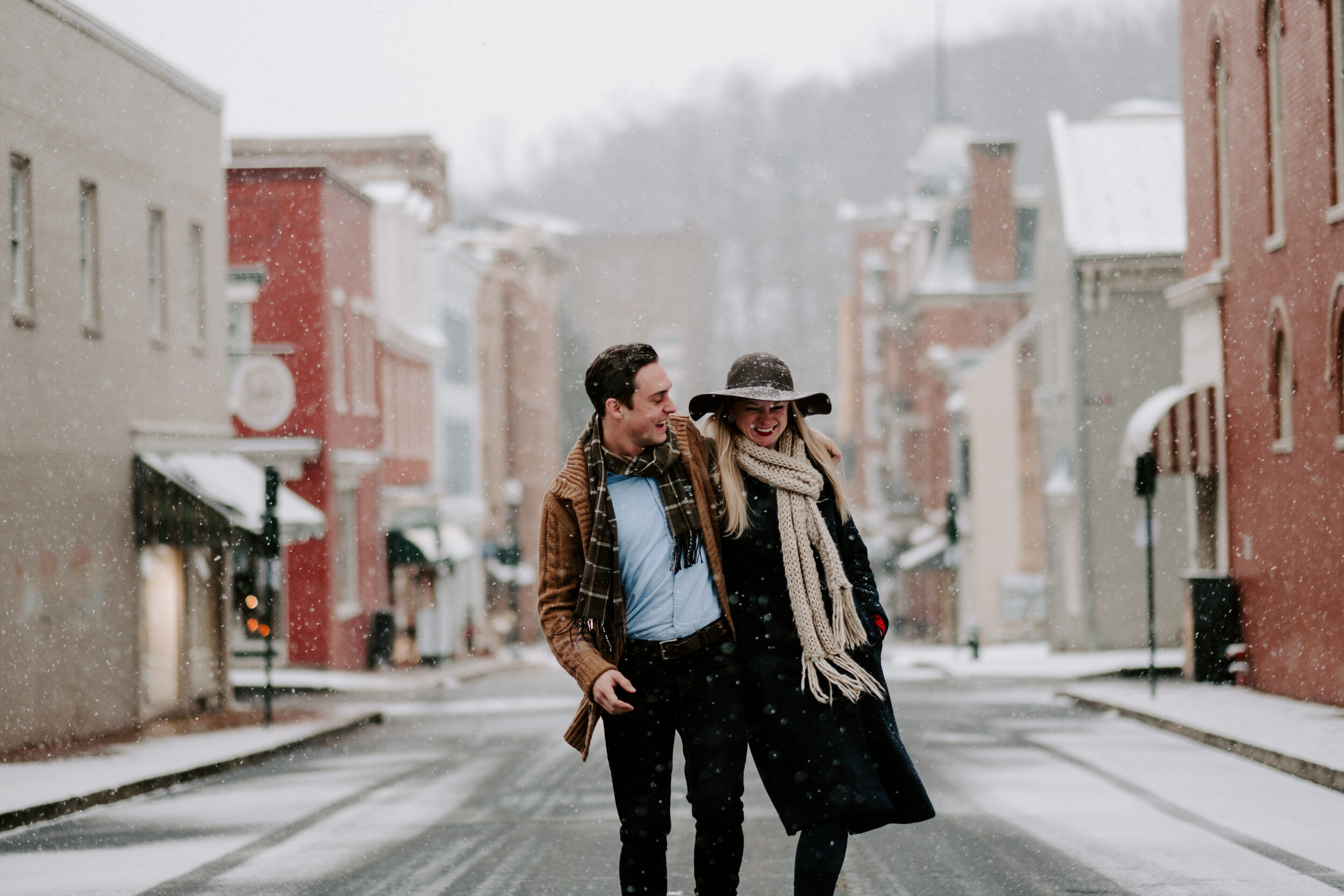 Couple in a snowy street Virginia Engagement Photography