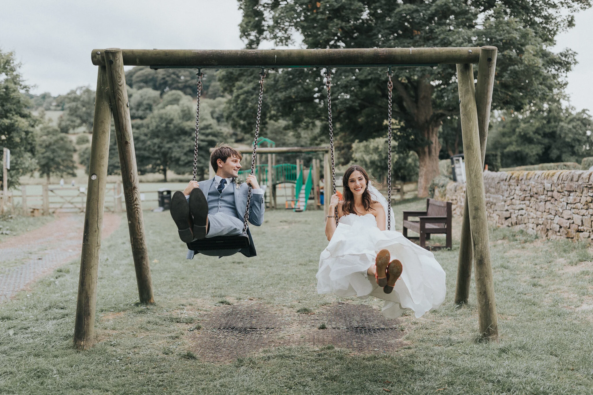 Bride and Groom on Swings Rowsley Wedding Peak District
