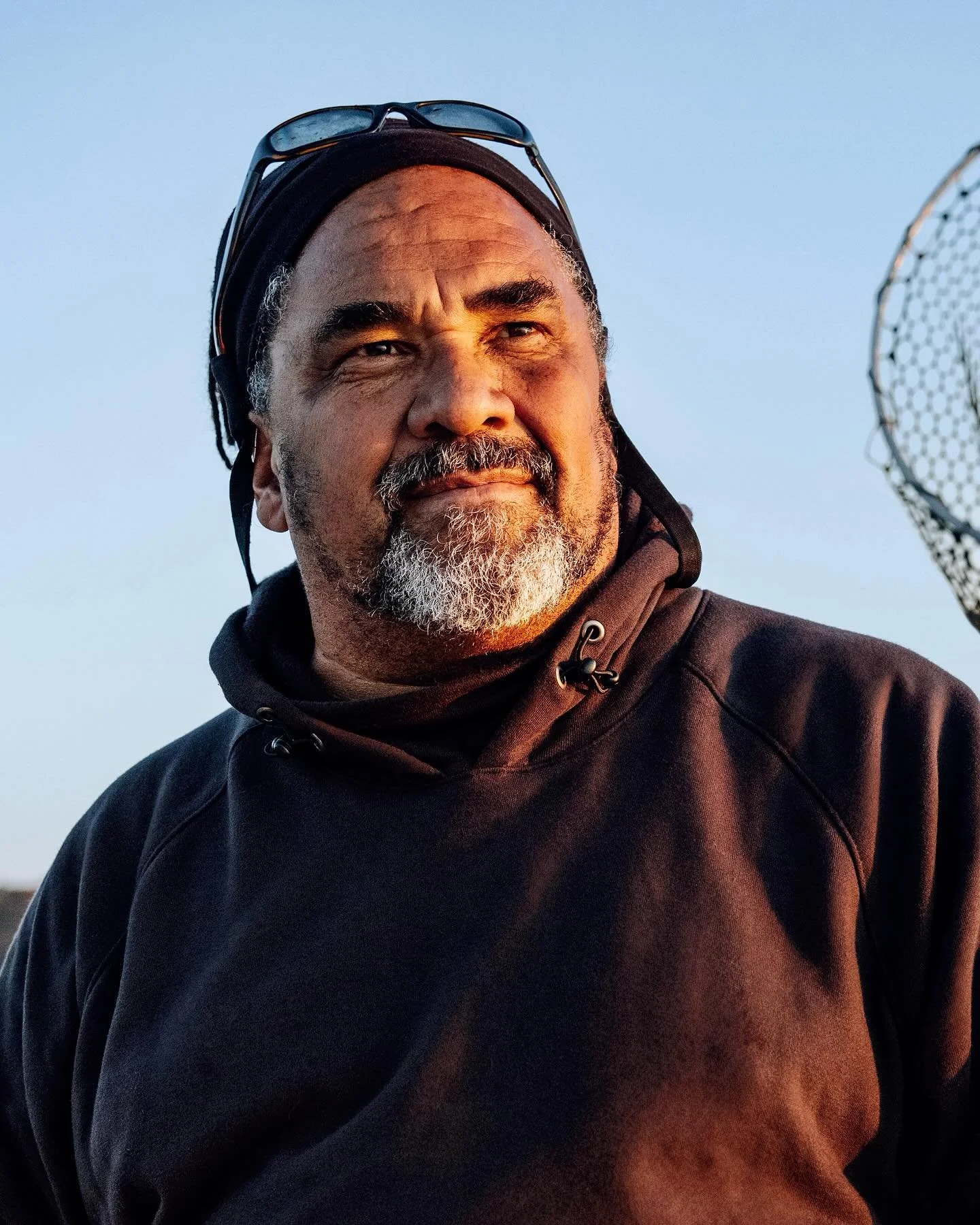 The moon is still a dime in the western sky,
but a band of sunlight has risen over the horizon as
Saturday tips into morning. An egret hunts for break-
fast on the far bank, but the Weekapaug Breachway is
otherwise empty. Jason Jarvis grabs a floatin