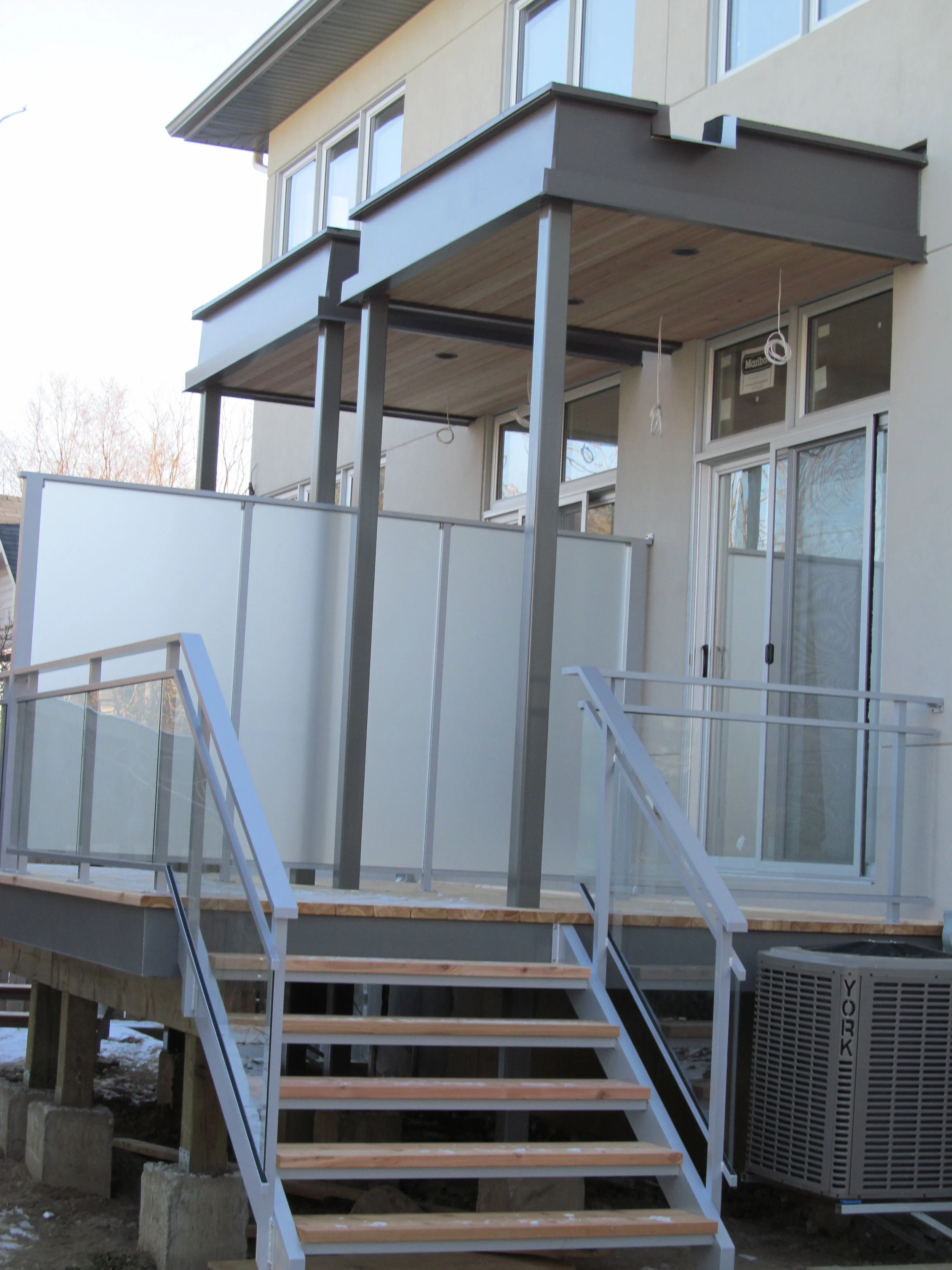 Supply and install powder coated steel members