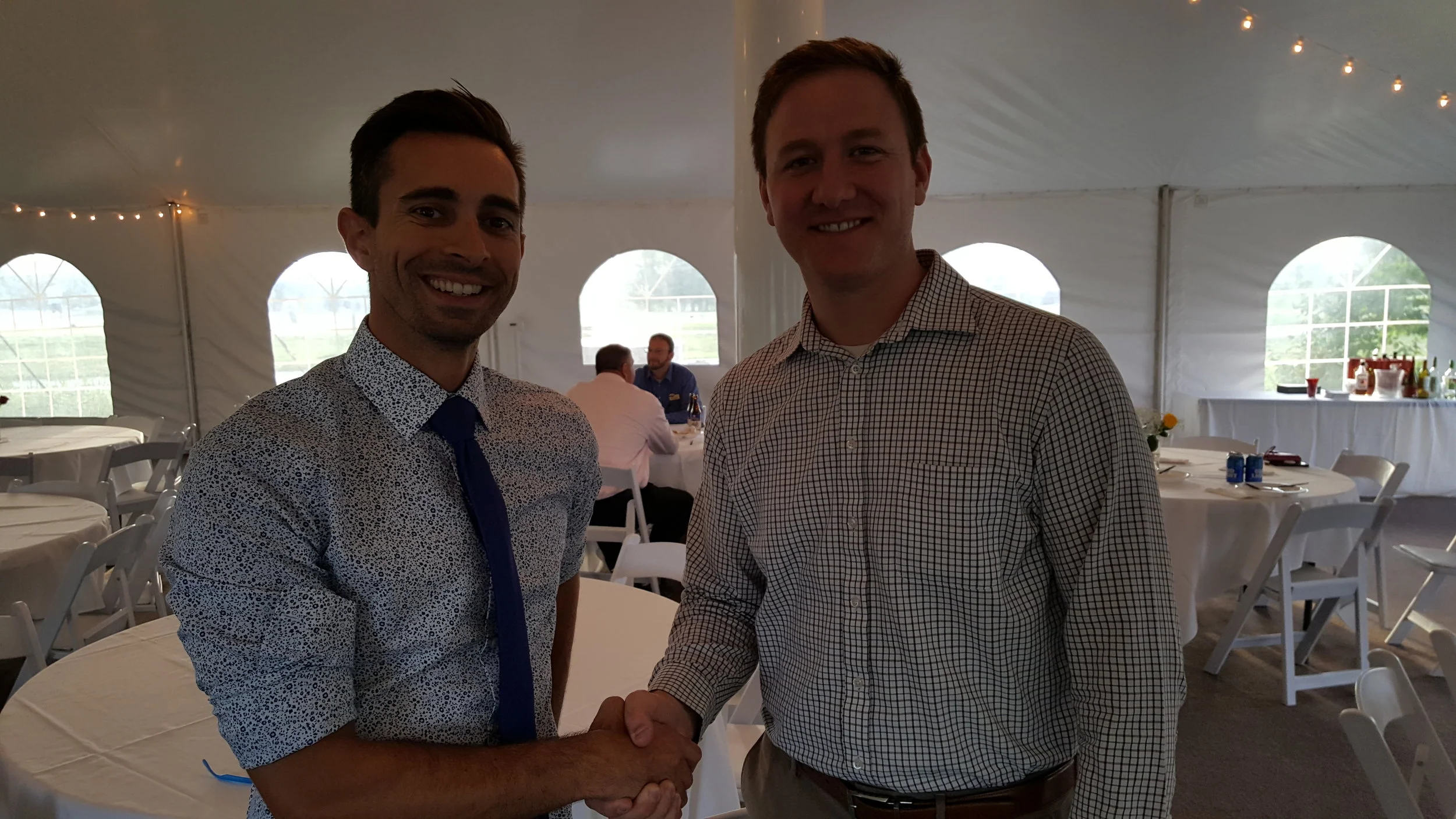President Sean Bull and Member at Large Jeremy Gebhardt at The Rail After Hours event.