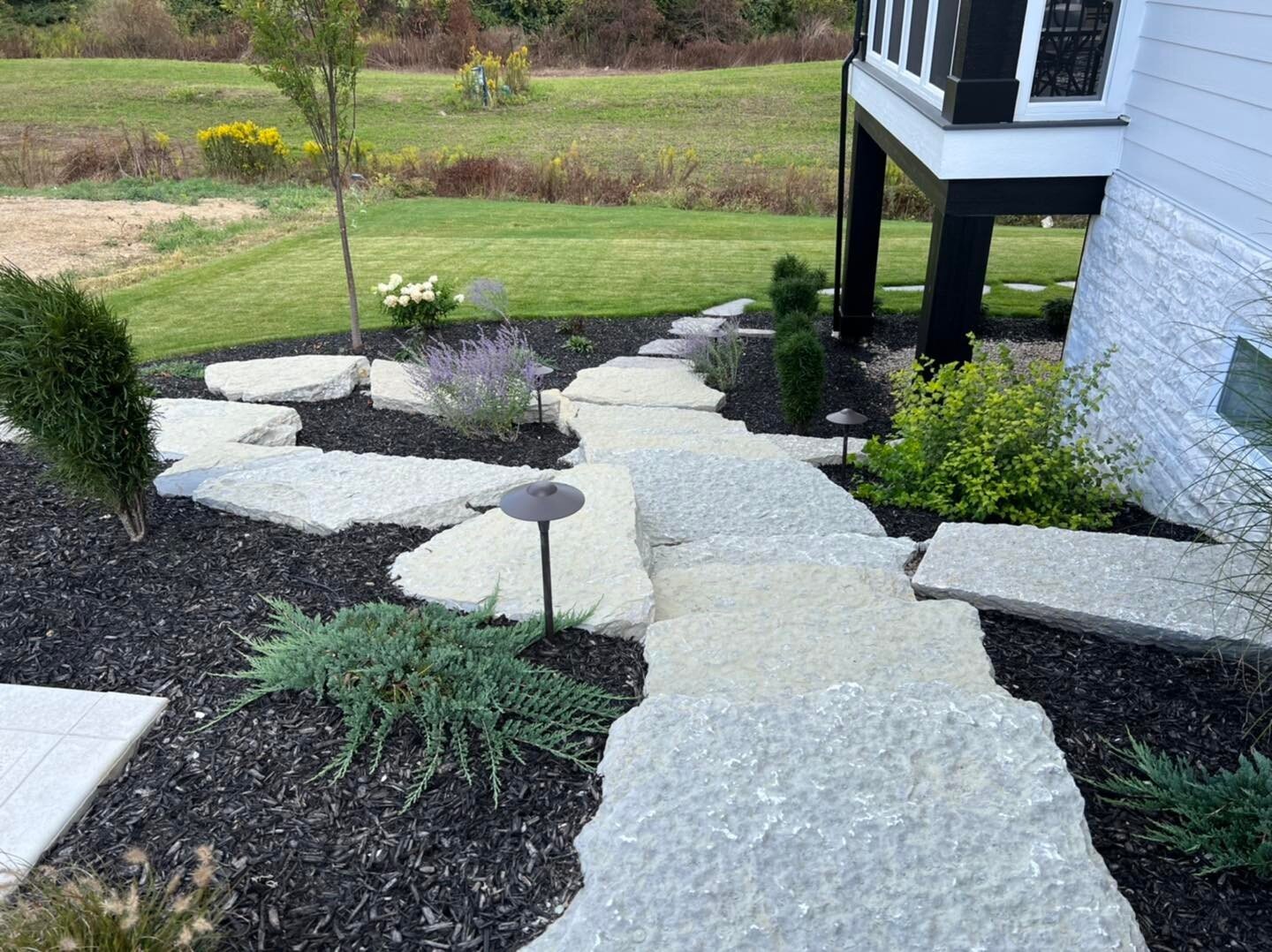 Step by step, we're turning dreams into reality. Our charming rock steps and paths pave the way to peaceful moments in your backyard sanctuary.

#backyarddesigns #stonepavers #landscapework #ciminellos #yarddesign #westervilleoh #westervilleohio #gar