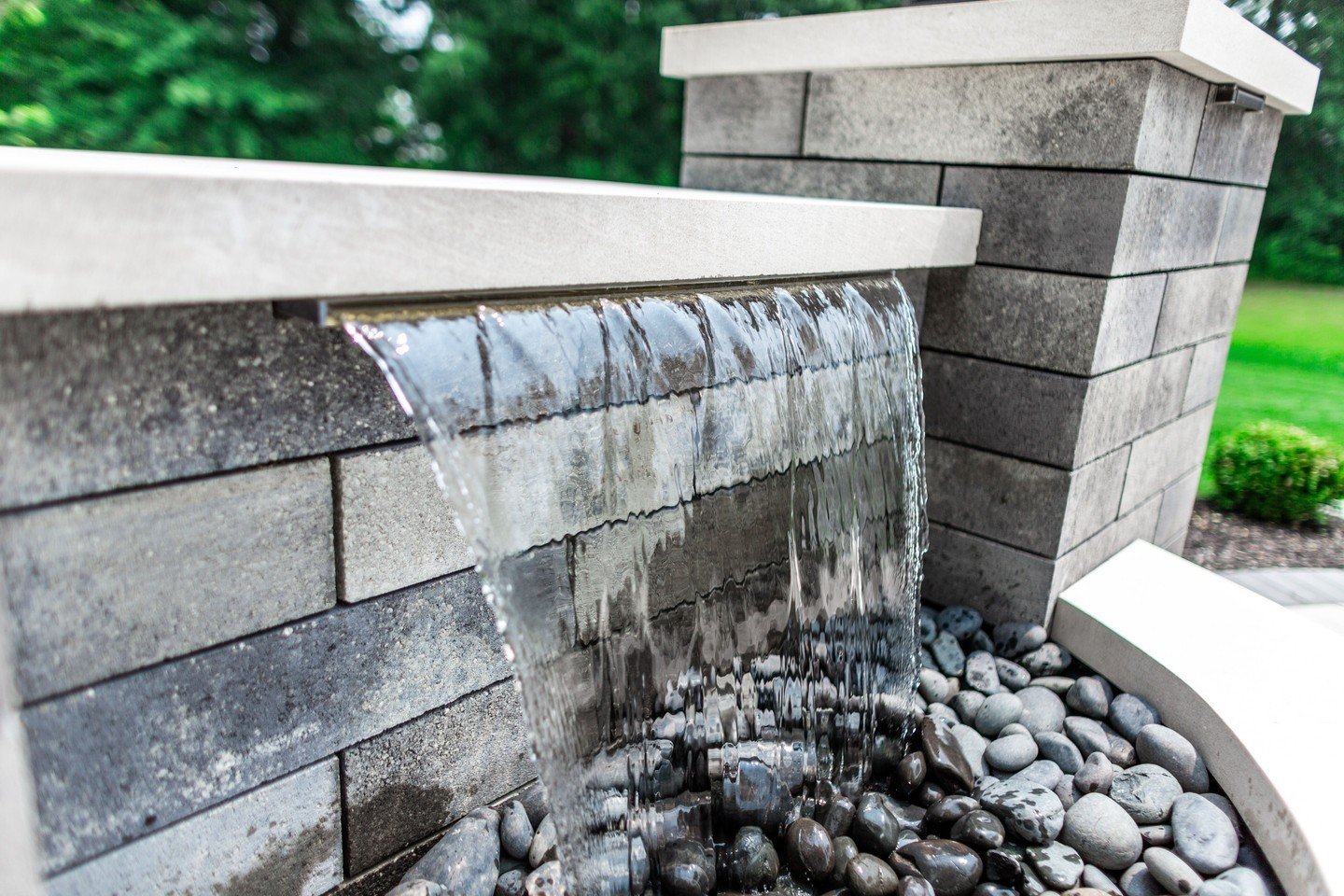 Where stone meets stream, let tranquility wash your worries away.

#yardrenovation #luxurylandscaping #indooroutdoorspace #landscapinginspo #hardscapepro #614family #columbusneighborhoods #delawareoh