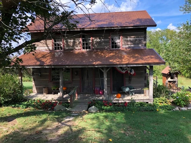 This cabin was built in the 1870’s and moved from it’s original location about 3 miles from the farm. They rent out the cabin to guests today. It’s really nicely done and they have a wood-fired pizza oven in the back.