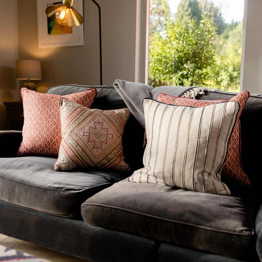 I could literally just sink in to this sofa with a coffee and book and probably be asleep within minutes, anyhow that's just me this week! 

Adding in a few bespoke cushions can really enhance and elevate existing or new furniture.  These cushions wo