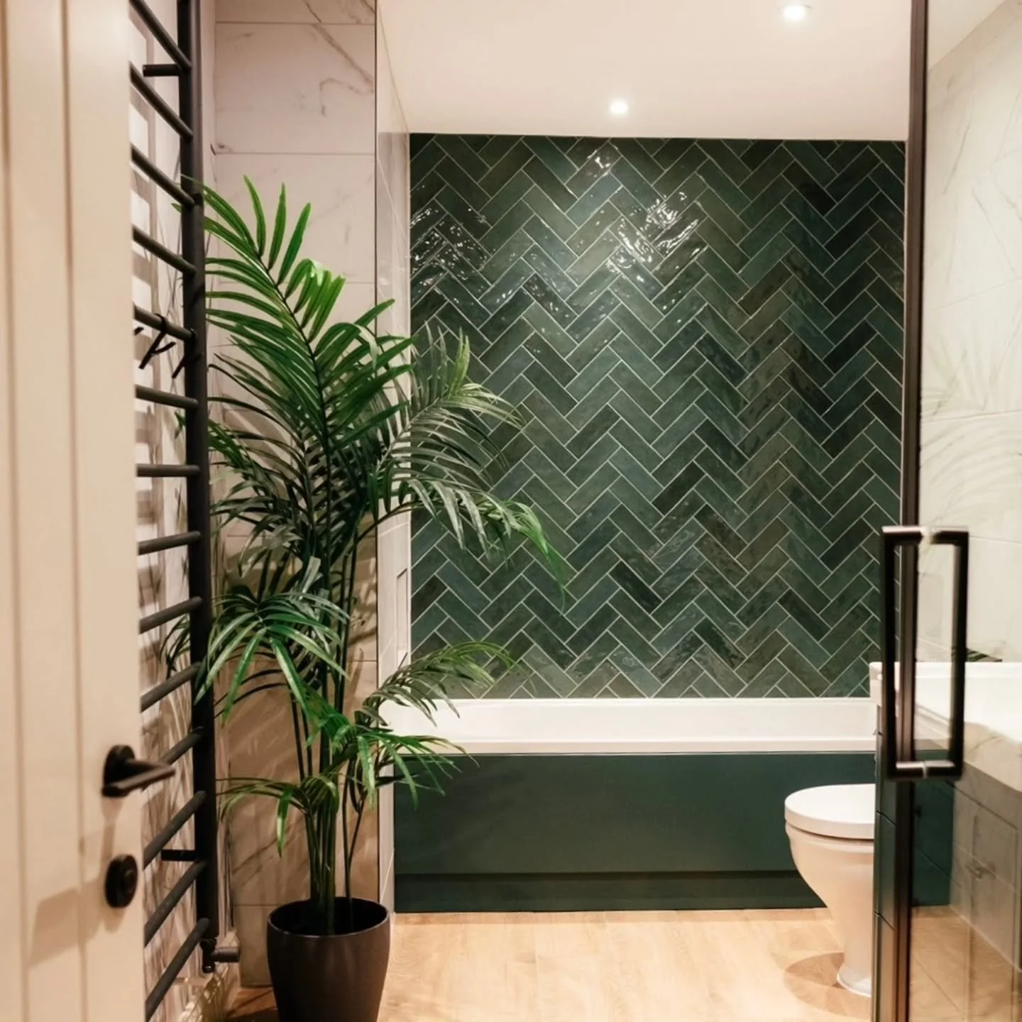 Bathroom design has come a long way!

Gone are the days of choosing just one tile, one paint colour, and a standard suite. Today&rsquo;s bathrooms are all about layers, texture, and personality.

In this space, three different tiles have been combine
