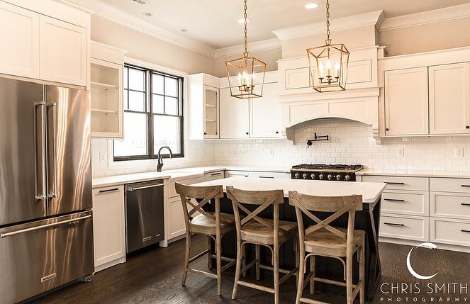 Check out this amazing kitchen from @curvepointcc in this gorgeous custom home we built a few years ago. Photos by @_chrissmithphotography_ #newconstruction #kitchendesign #kitchen #kitchenisland