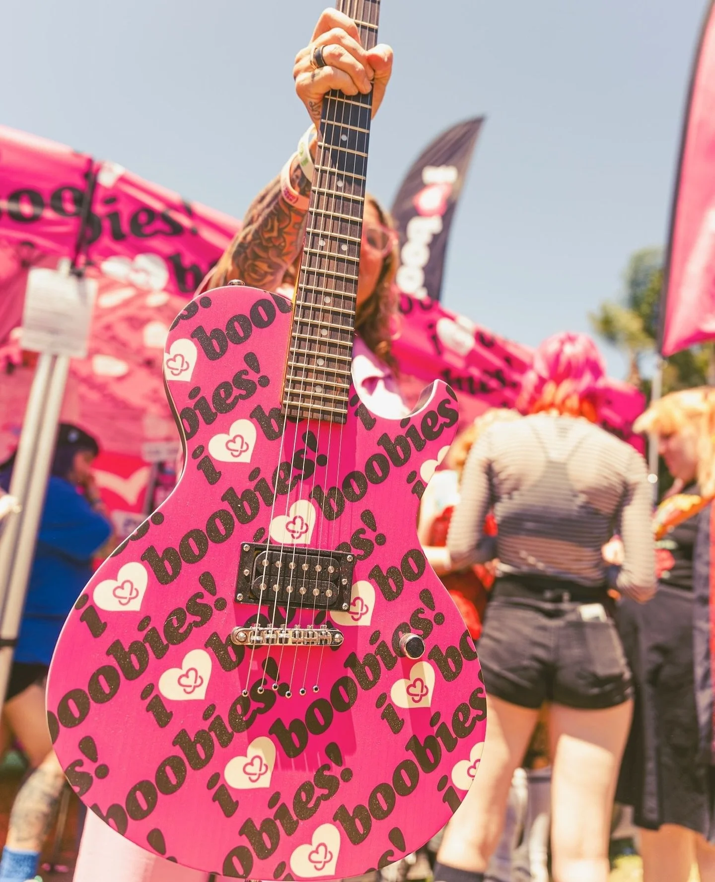 🎸 Giveaway alert! 🚨 SCHECTER GUITAR RESEARCH - you&rsquo;re a real one!⁠
⁠
We&rsquo;re so obsessed with this amazing @schecterguitarsofficial x i love boobies! custom guitar we had out on display at @vanswarpedtour Long Beach.⁠
⁠
Shoutout to @secur