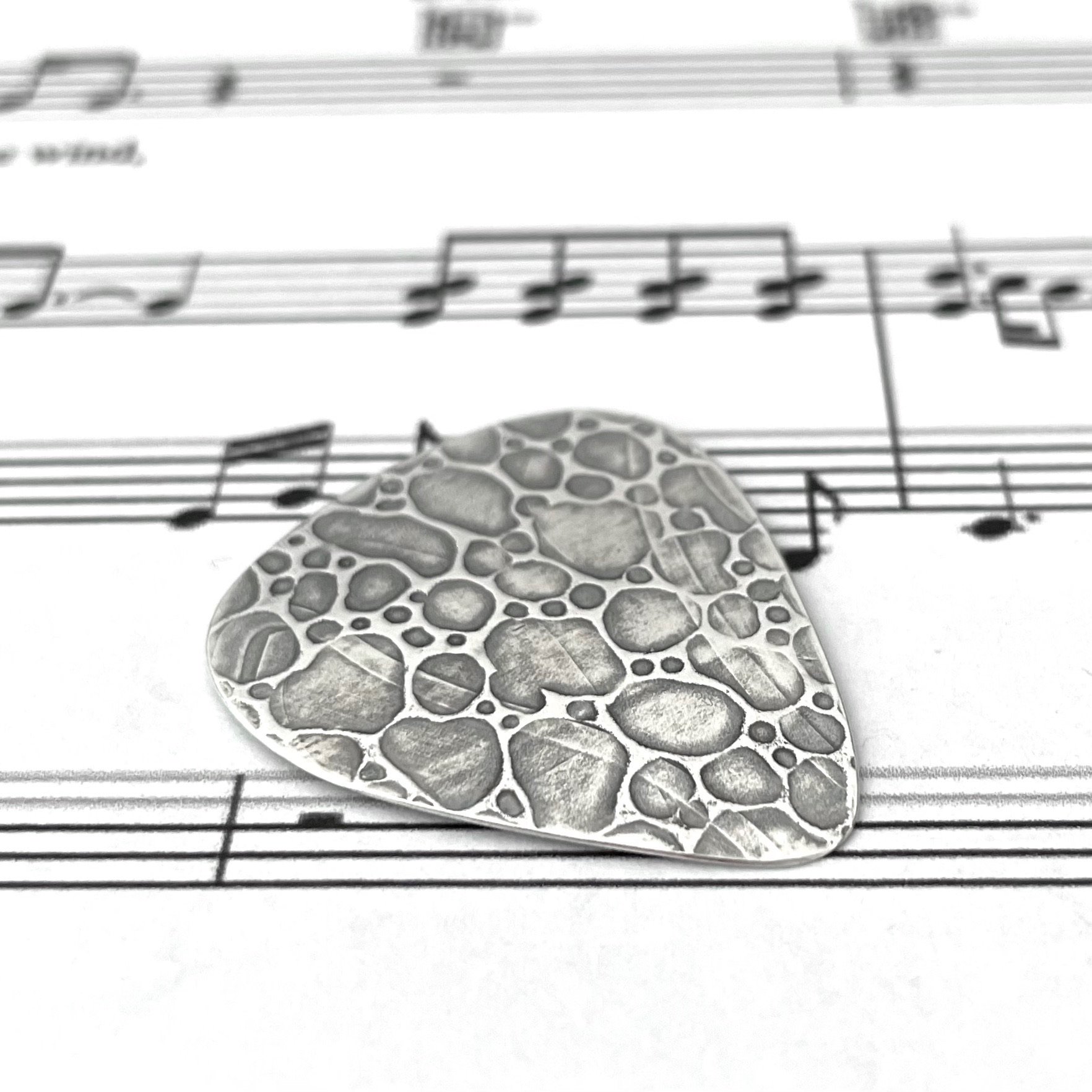 Guitar Pick Rock.jpeg