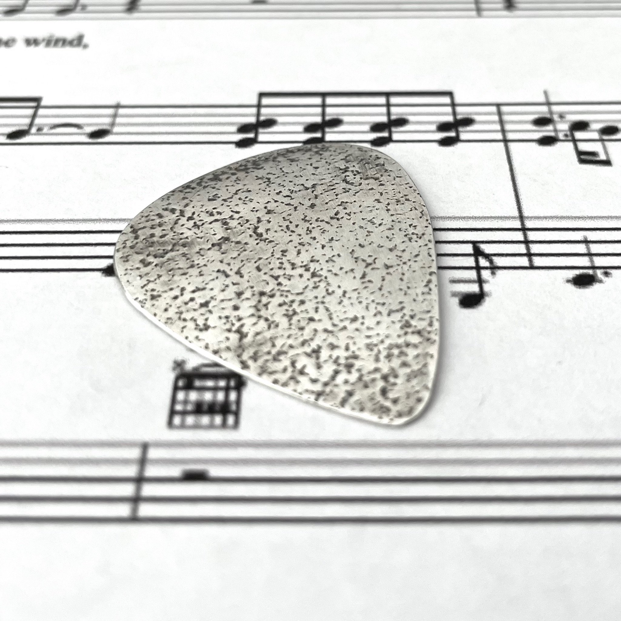 Guitar Pick Sand.jpeg