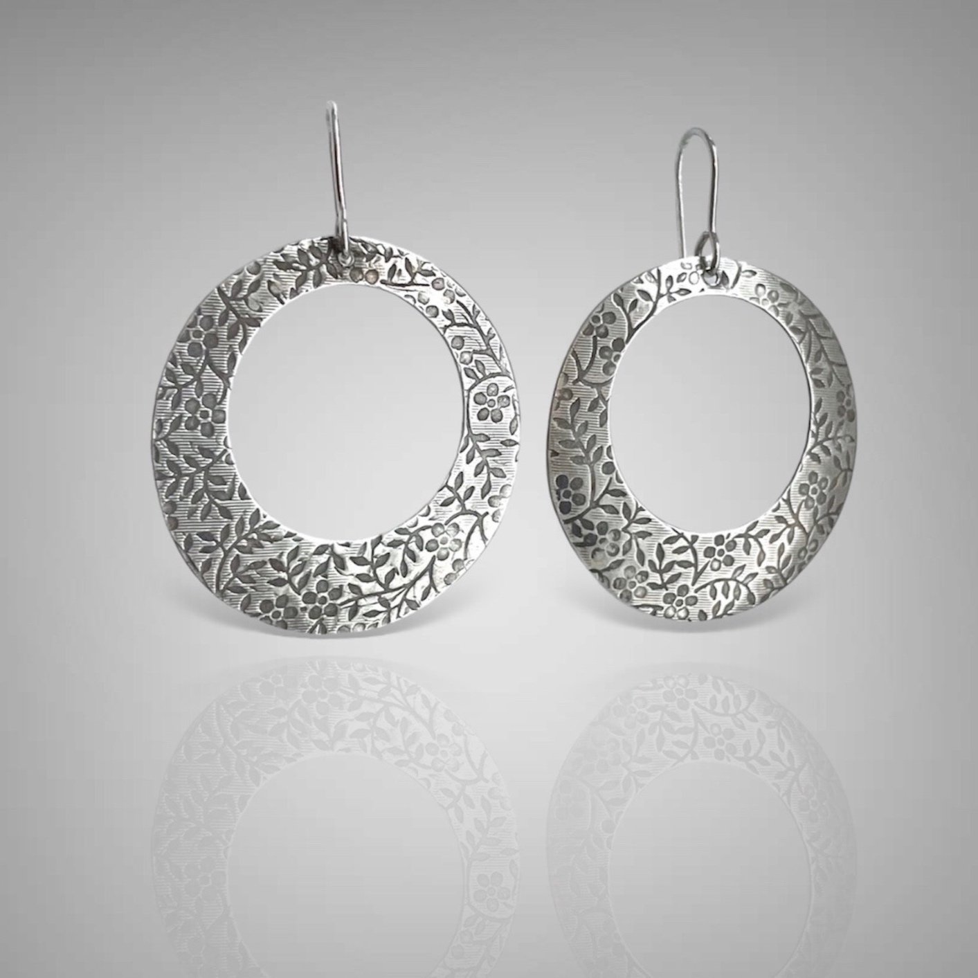 Wide+Patterned+Hoop+Earrings+Refl.jpg