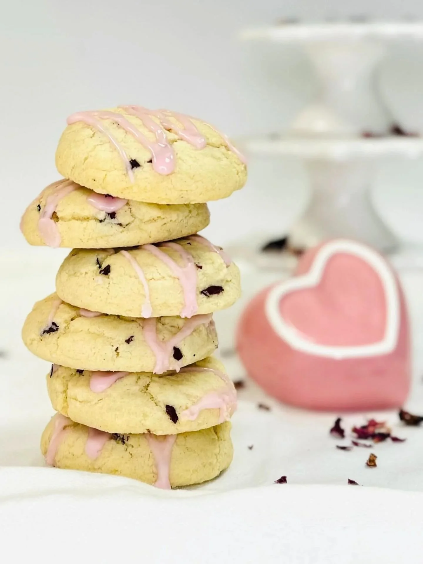 Our rose petal tea cookies are drizzled with a sweet, beet-dyed glaze and flavored with the perfect amount of organic dried rose petals🌹. 

Available in cute packs of five, online or in the bakery.

Order by 2/8 to guarantee shipping in time for Val