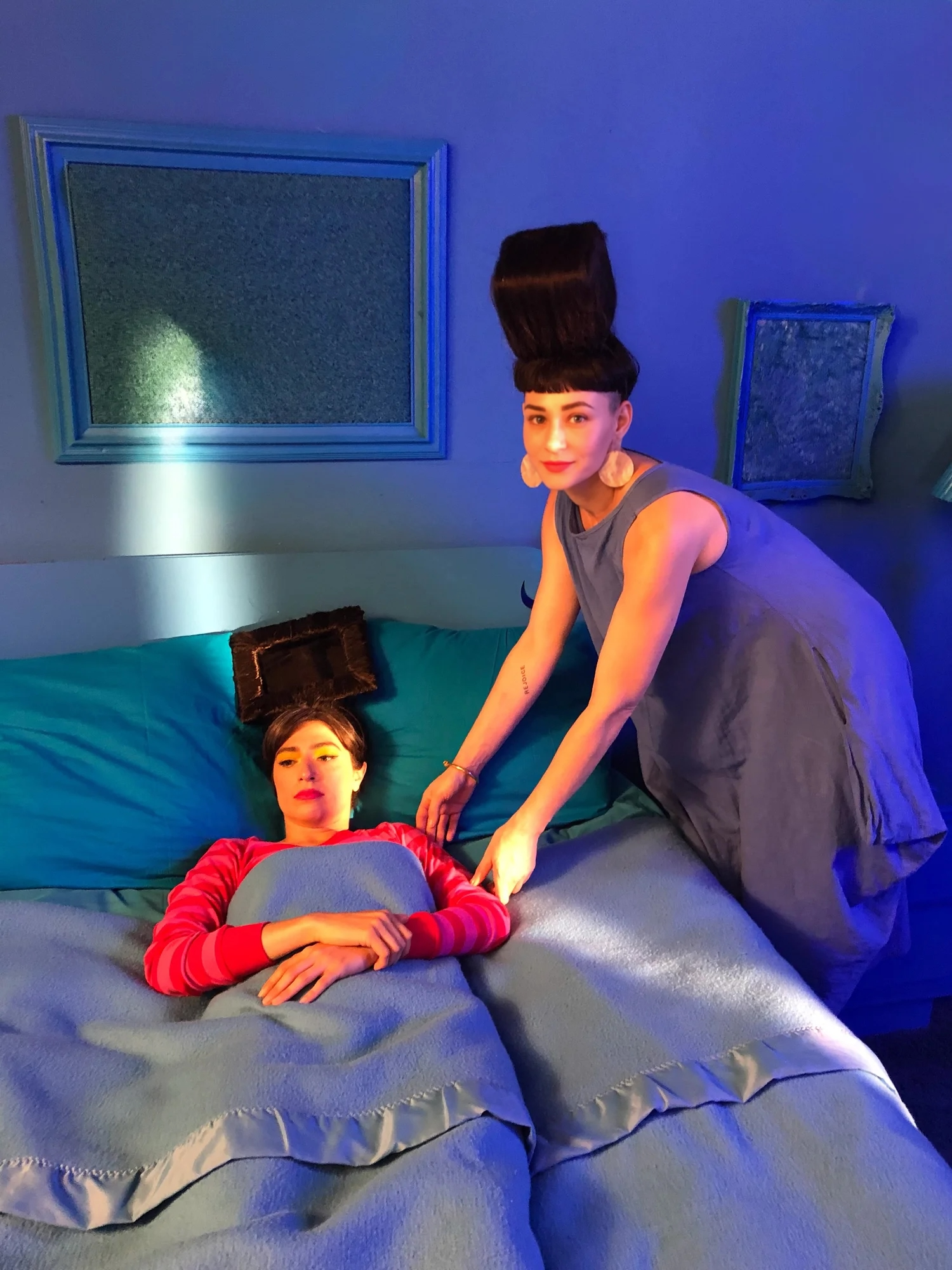On set photo of Julia This and SNL's Melissa Villasenor by Jon Joiner