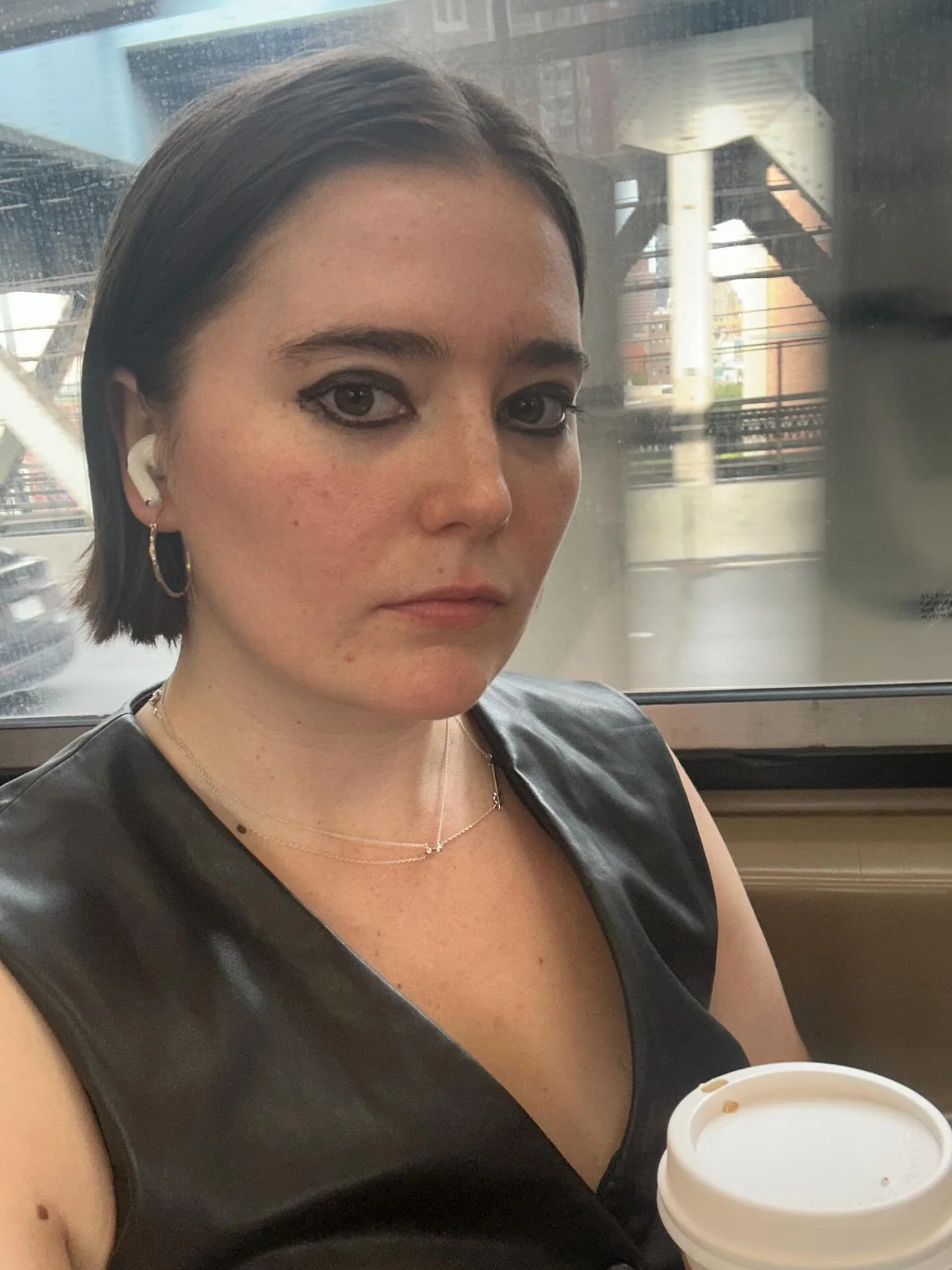 Being held momentarily/momentarily being held.

Taking the Q train from Brooklyn to Manhattan as autumn arrives in New York.