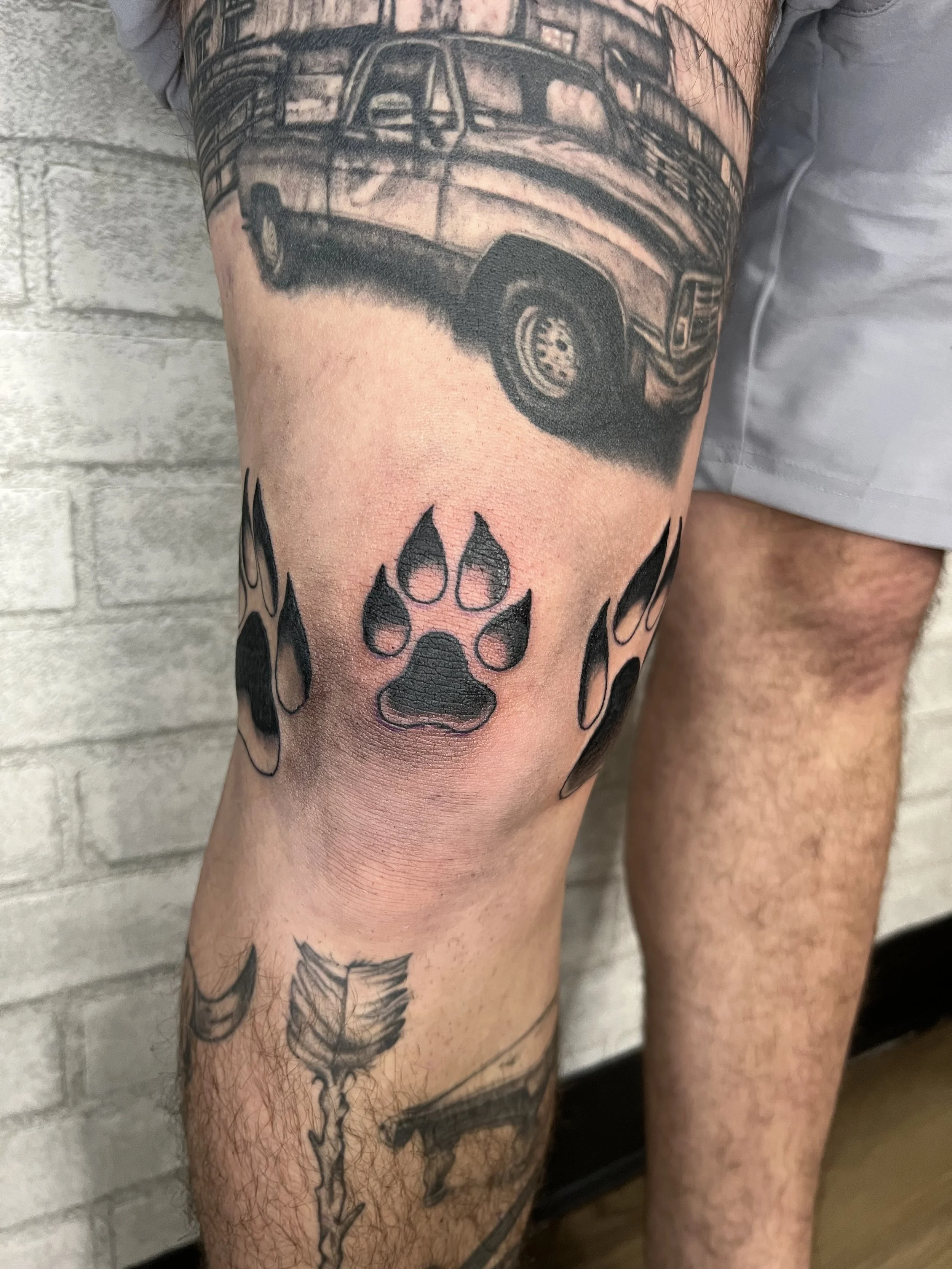 evol tattoo, local tattoos, lehigh valley tattoos, allentown tattoos, catasauqua tattoos, black and gray tattoo, paw print tattoo, dog tattoo, animal tattoo, animal lover tattoo, memorial tattoo.jpeg