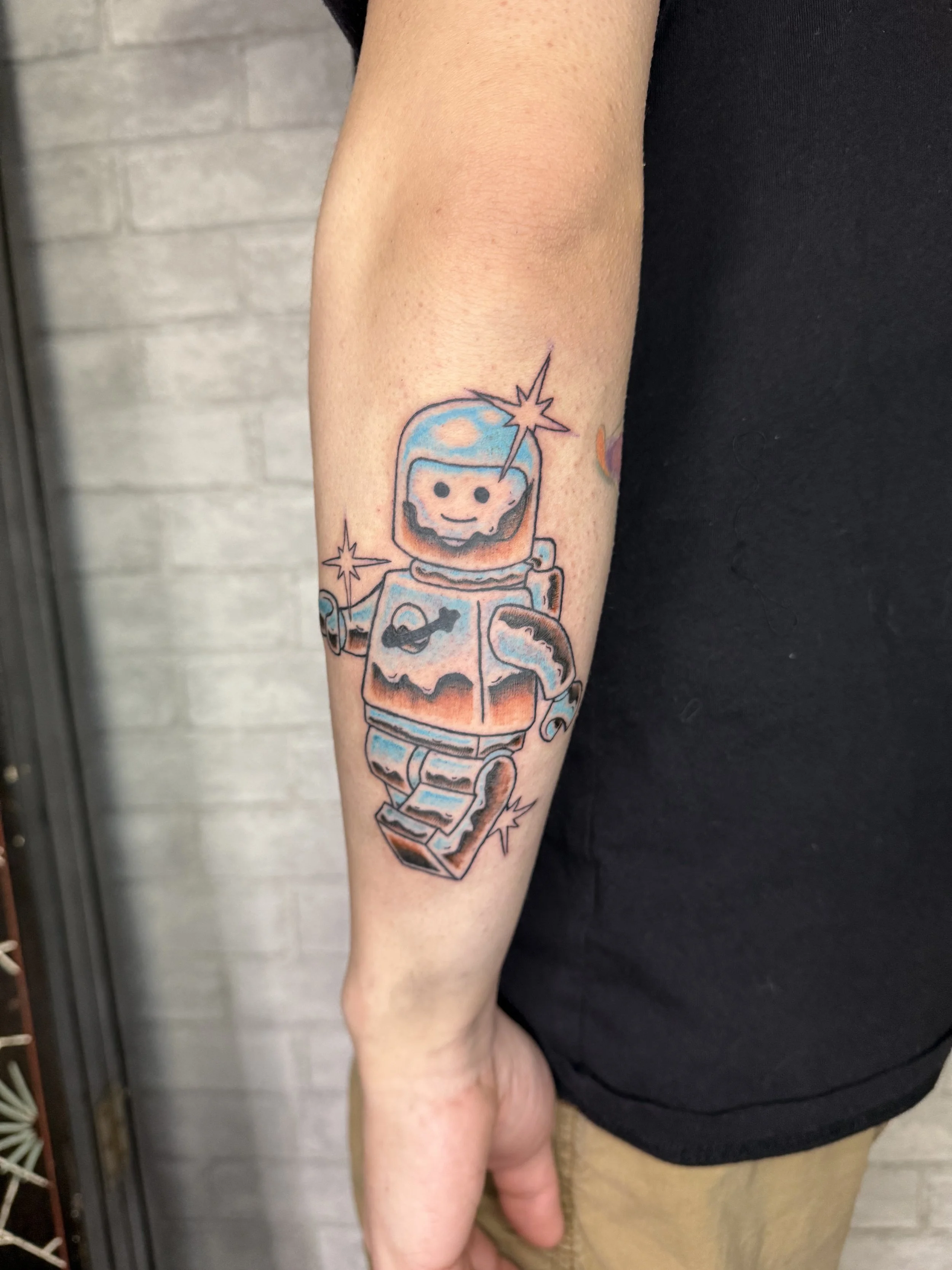 evol tattoo, local tattoos, lehigh valley tattoos, allentown tattoos, catasauqua tattoos, color tattoo, chrome tattoo, lego tattoo, space tattoo, spaceman tattoo, astronaut tattoo, toy tattoo.jpeg