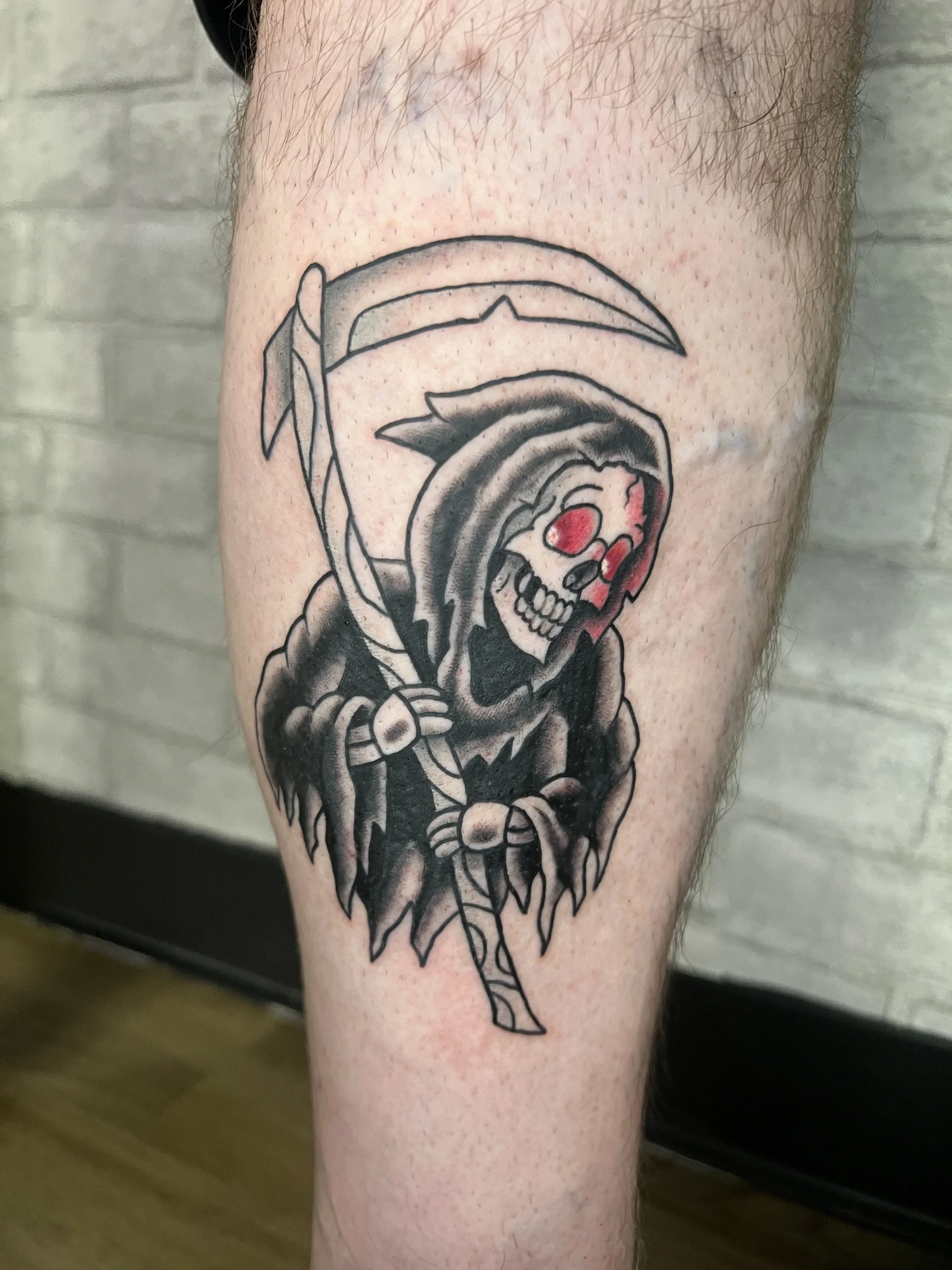 evol tattoo, local tattoos, lehigh valley tattoos, allentown tattoos, black and gray tattoo, grim reaper tattoo, skull tattoo, cartoon tattoo, traditional tattoo, cool tattoo.jpeg