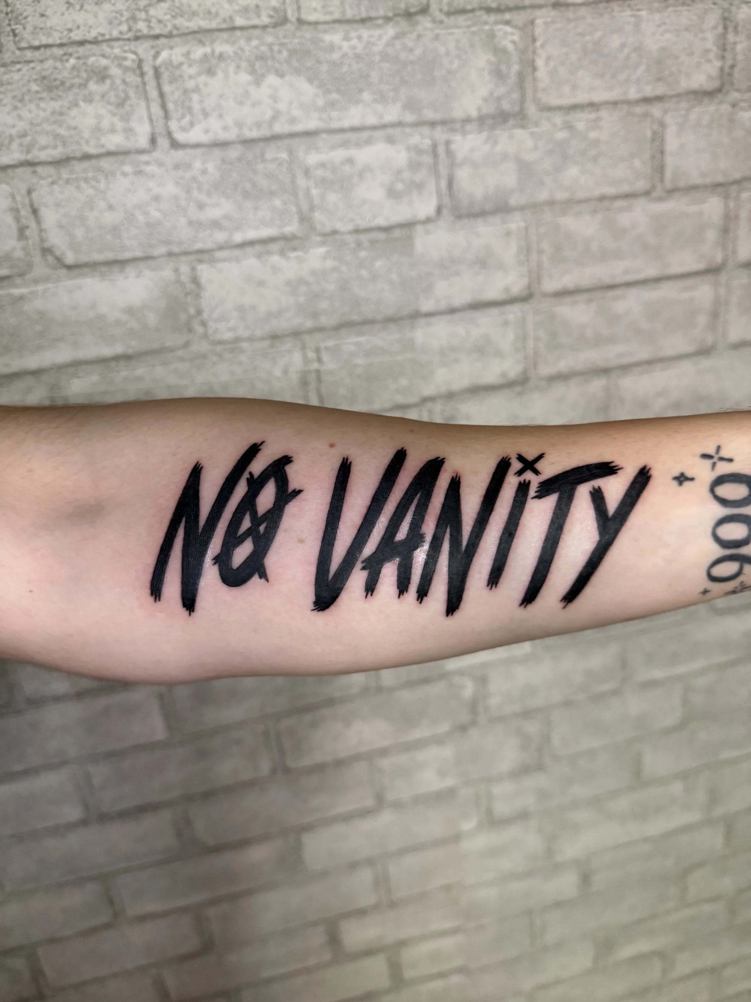 evol tattoo, local tattoos, lehigh valley tattoos, allentown tattoos, black and gray tattoo, lettering tattoo, graffiti tattoo, juice wrld tattoo, rapper tattoo, music tattoo, blackwork tattoo.jpeg