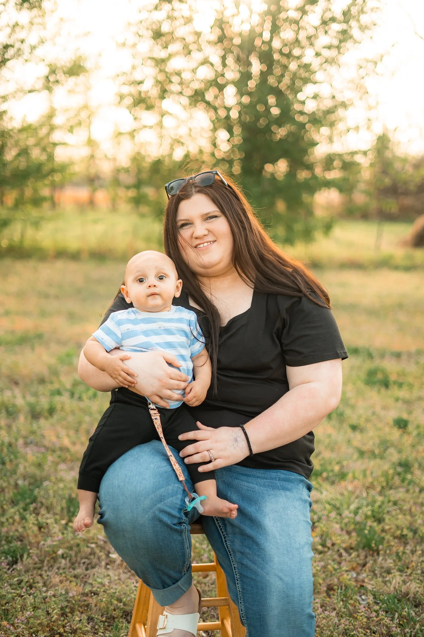  East Prairie Senior Portrait Session. Senior Photographer near Cape Girardeau Missouri. Golden Hour session with pond. Hobbies including four wheelers, fishing and drawing. Senior Session in Nature. Plus Sized Senior Portrait ideas. Poses for plus s