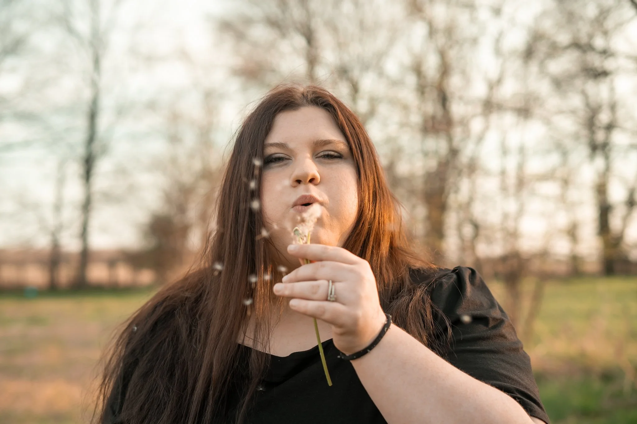  East Prairie Senior Portrait Session. Senior Photographer near Cape Girardeau Missouri. Golden Hour session with pond. Hobbies including four wheelers, fishing and drawing. Senior Session in Nature. Plus Sized Senior Portrait ideas. Poses for plus s