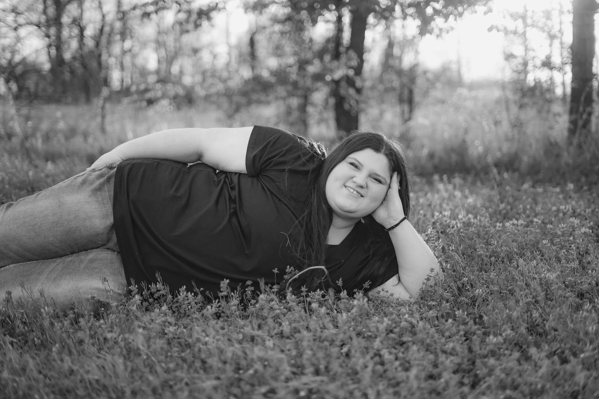  East Prairie Senior Portrait Session. Senior Photographer near Cape Girardeau Missouri. Golden Hour session with pond. Hobbies including four wheelers, fishing and drawing. Senior Session in Nature. Plus Sized Senior Portrait ideas. Poses for plus s