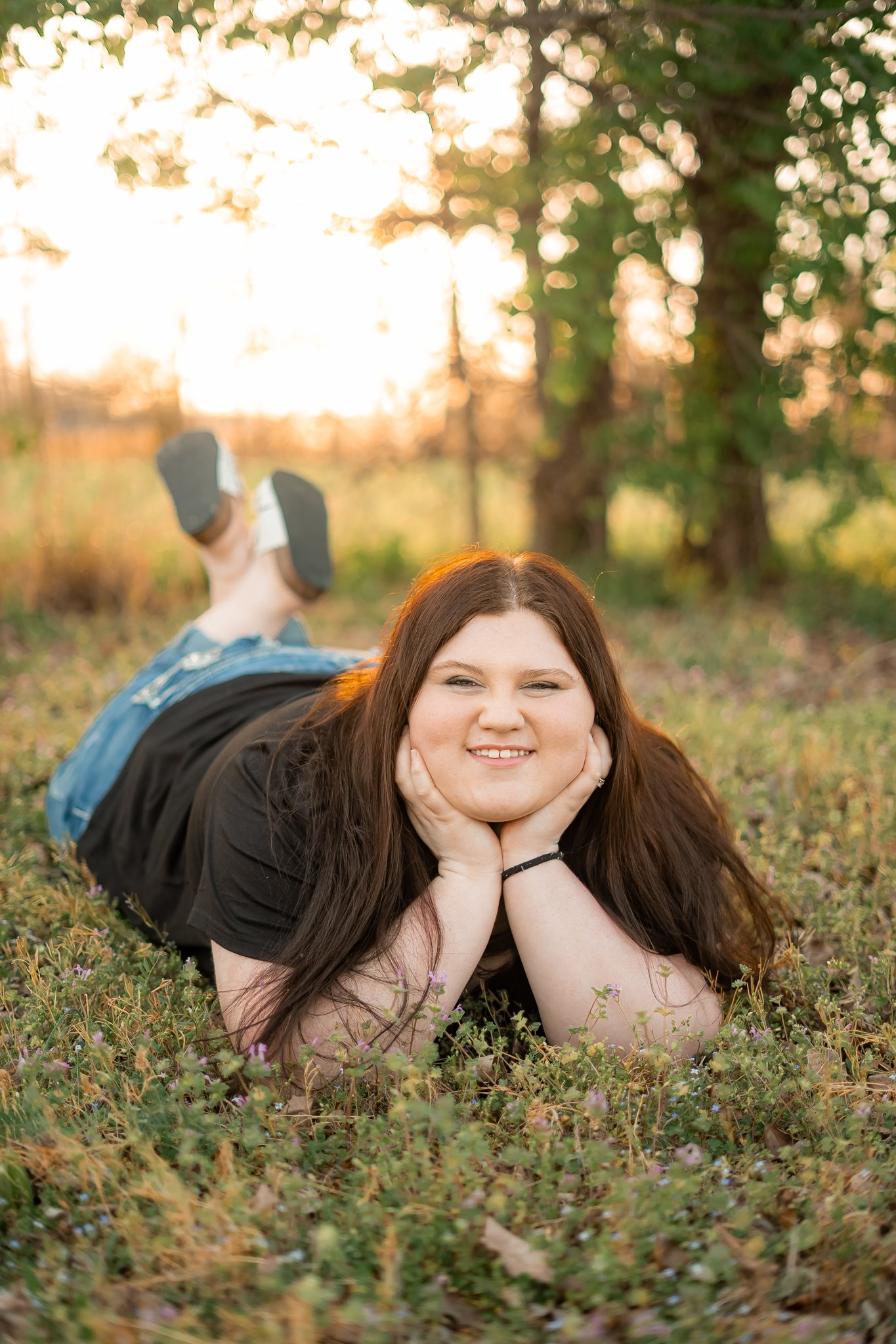  East Prairie Senior Portrait Session. Senior Photographer near Cape Girardeau Missouri. Golden Hour session with pond. Hobbies including four wheelers, fishing and drawing. Senior Session in Nature. Plus Sized Senior Portrait ideas. Poses for plus s