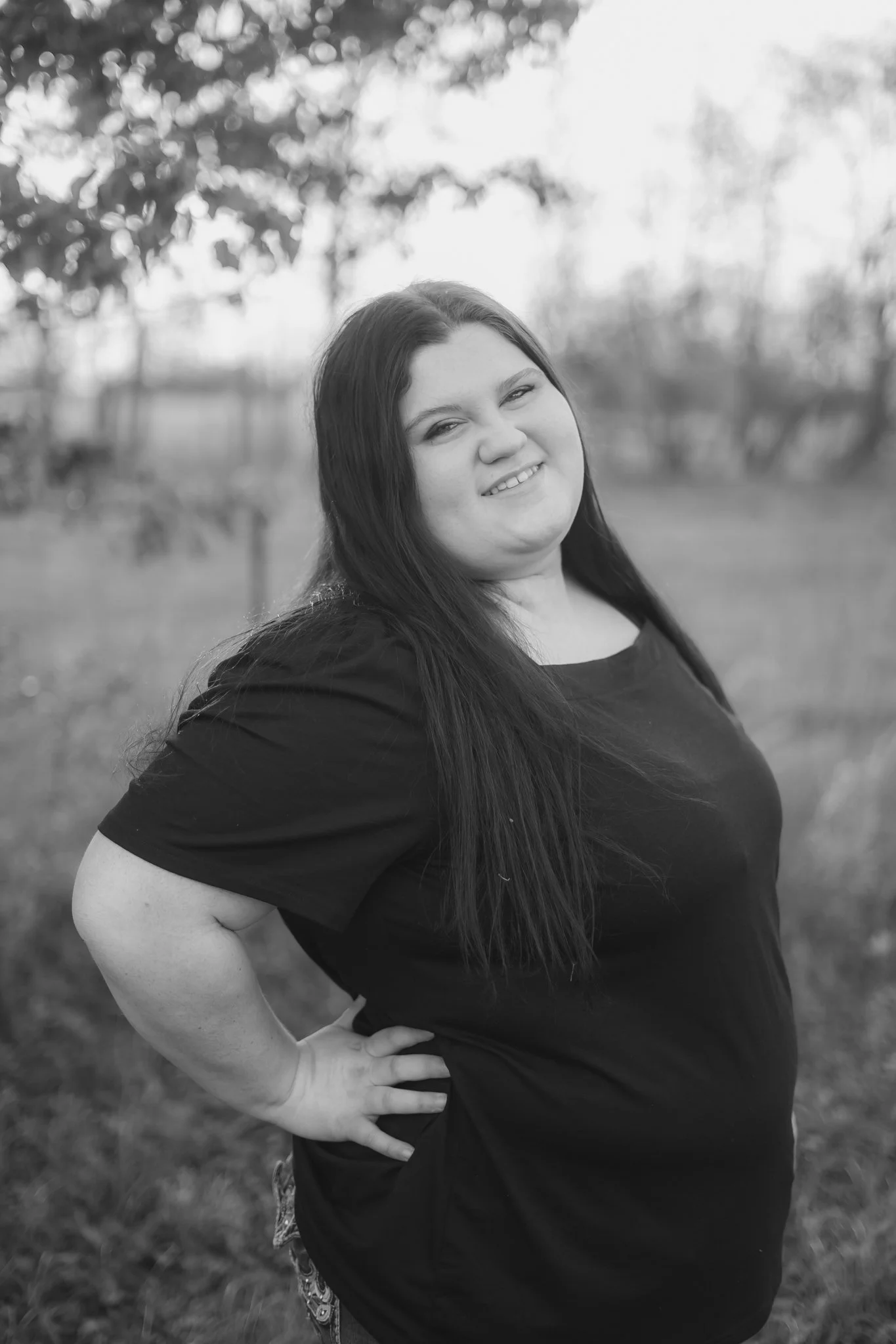  East Prairie Senior Portrait Session. Senior Photographer near Cape Girardeau Missouri. Golden Hour session with pond. Hobbies including four wheelers, fishing and drawing. Senior Session in Nature. Plus Sized Senior Portrait ideas. Poses for plus s
