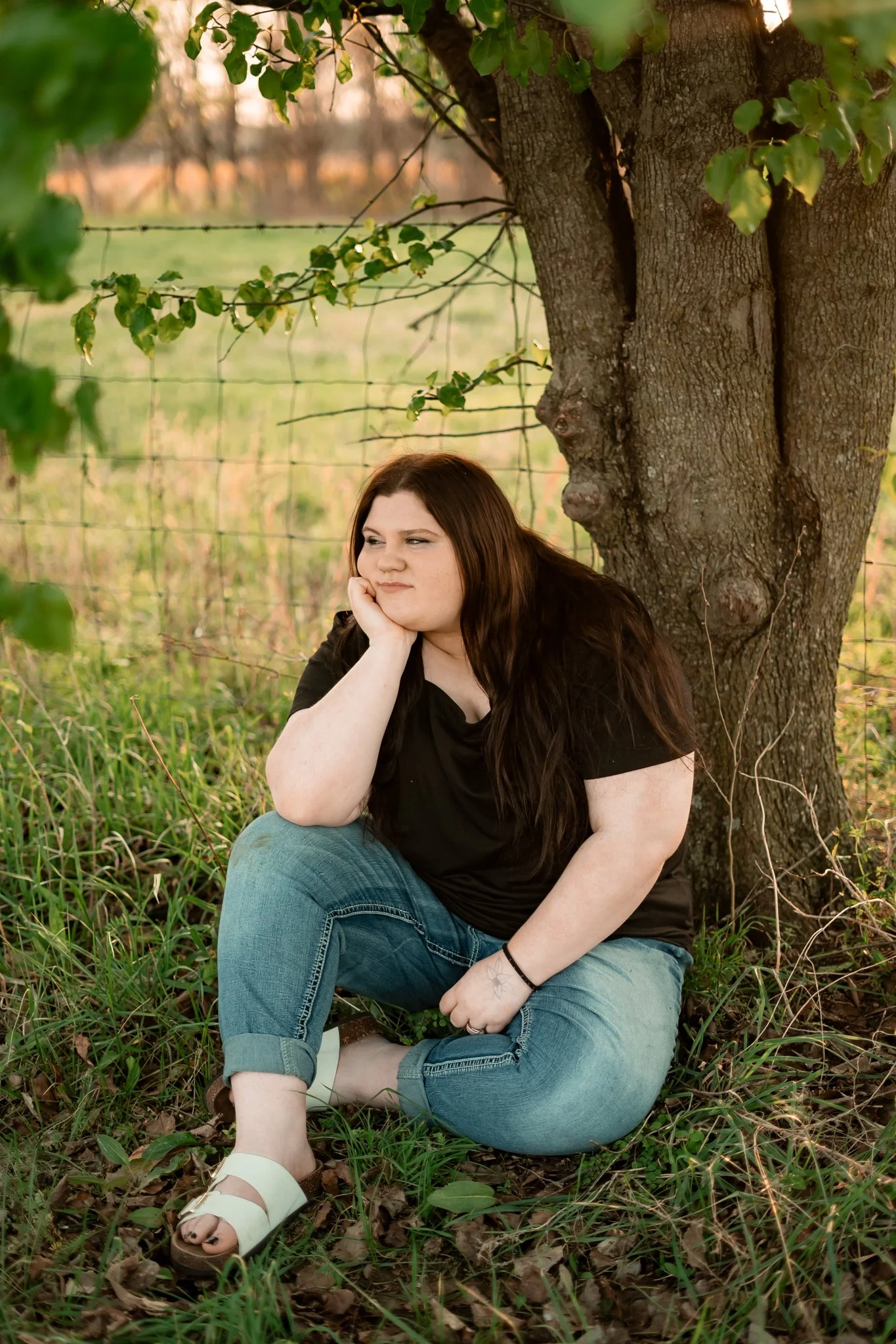  East Prairie Senior Portrait Session. Senior Photographer near Cape Girardeau Missouri. Golden Hour session with pond. Hobbies including four wheelers, fishing and drawing. Senior Session in Nature. Plus Sized Senior Portrait ideas. Poses for plus s