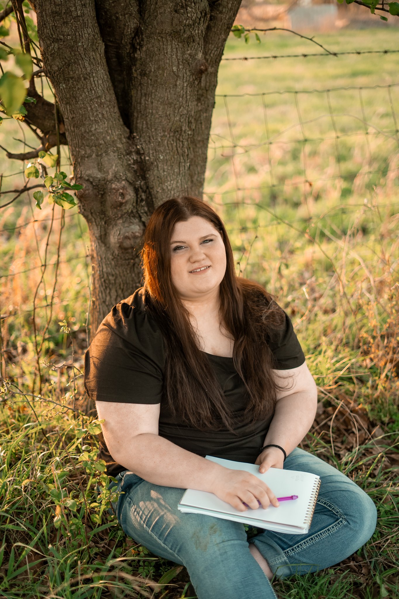  East Prairie Senior Portrait Session. Senior Photographer near Cape Girardeau Missouri. Golden Hour session with pond. Hobbies including four wheelers, fishing and drawing. Senior Session in Nature. Plus Sized Senior Portrait ideas. Poses for plus s