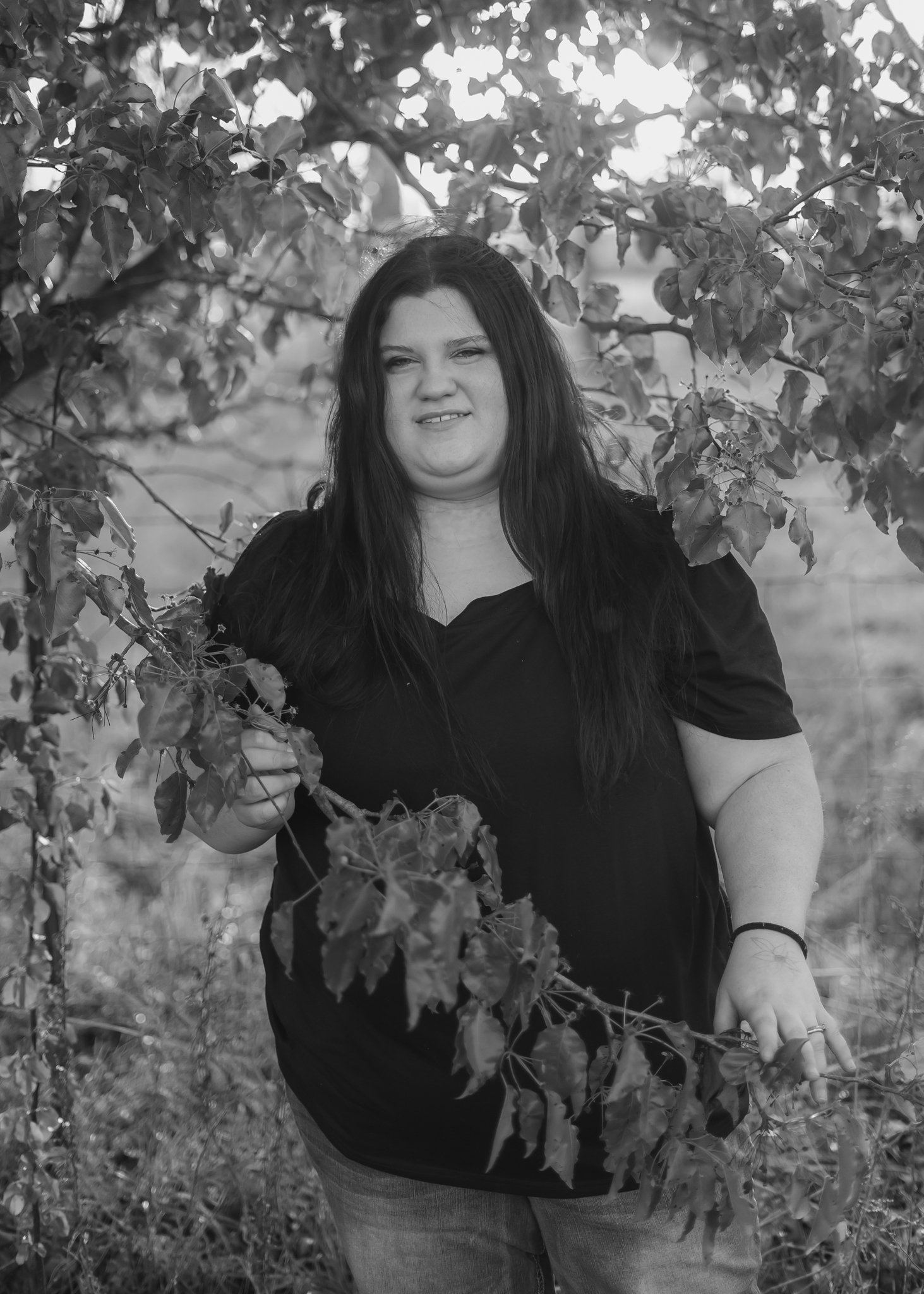  East Prairie Senior Portrait Session. Senior Photographer near Cape Girardeau Missouri. Golden Hour session with pond. Hobbies including four wheelers, fishing and drawing. Senior Session in Nature. Plus Sized Senior Portrait ideas. Poses for plus s