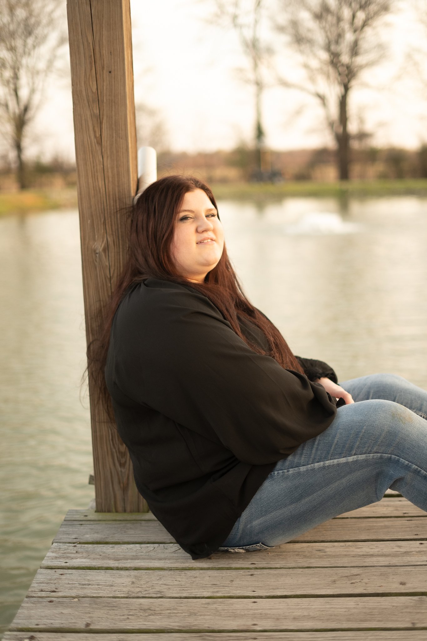  East Prairie Senior Portrait Session. Senior Photographer near Cape Girardeau Missouri. Golden Hour session with pond. Hobbies including four wheelers, fishing and drawing. Senior Session in Nature. Plus Sized Senior Portrait ideas. Poses for plus s
