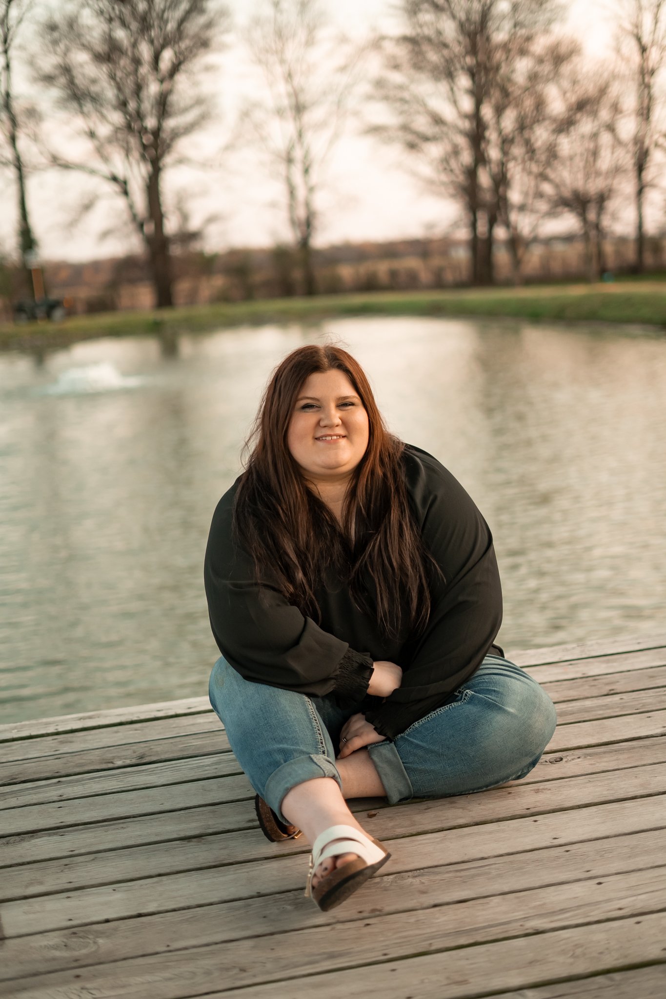  East Prairie Senior Portrait Session. Senior Photographer near Cape Girardeau Missouri. Golden Hour session with pond. Hobbies including four wheelers, fishing and drawing. Senior Session in Nature. Plus Sized Senior Portrait ideas. Poses for plus s