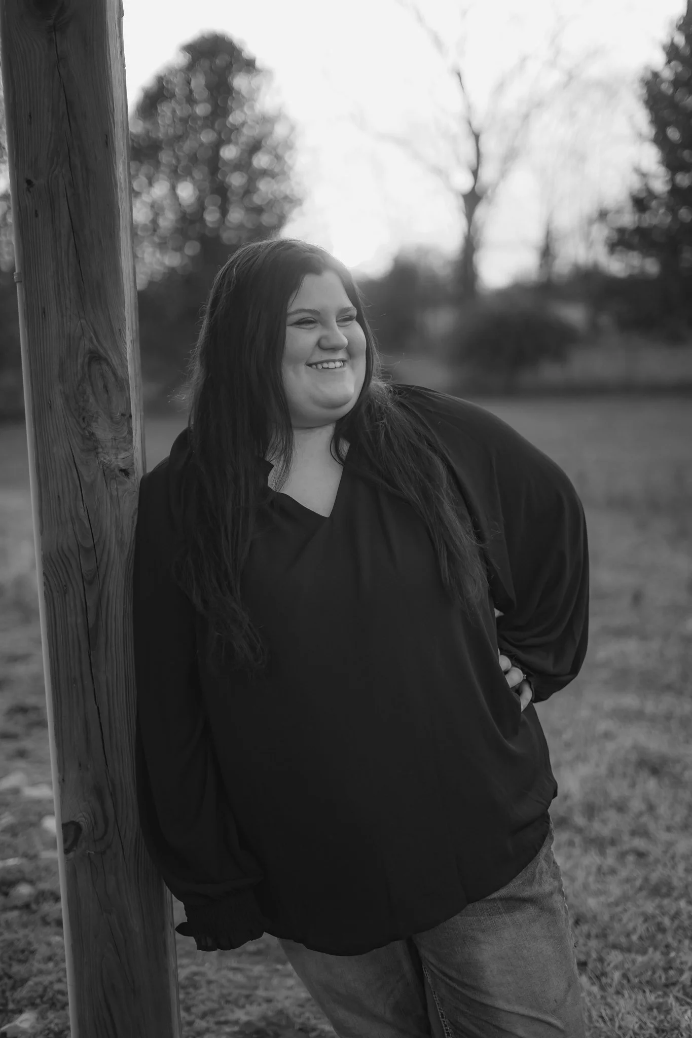  East Prairie Senior Portrait Session. Senior Photographer near Cape Girardeau Missouri. Golden Hour session with pond. Hobbies including four wheelers, fishing and drawing. Senior Session in Nature. Plus Sized Senior Portrait ideas. Poses for plus s