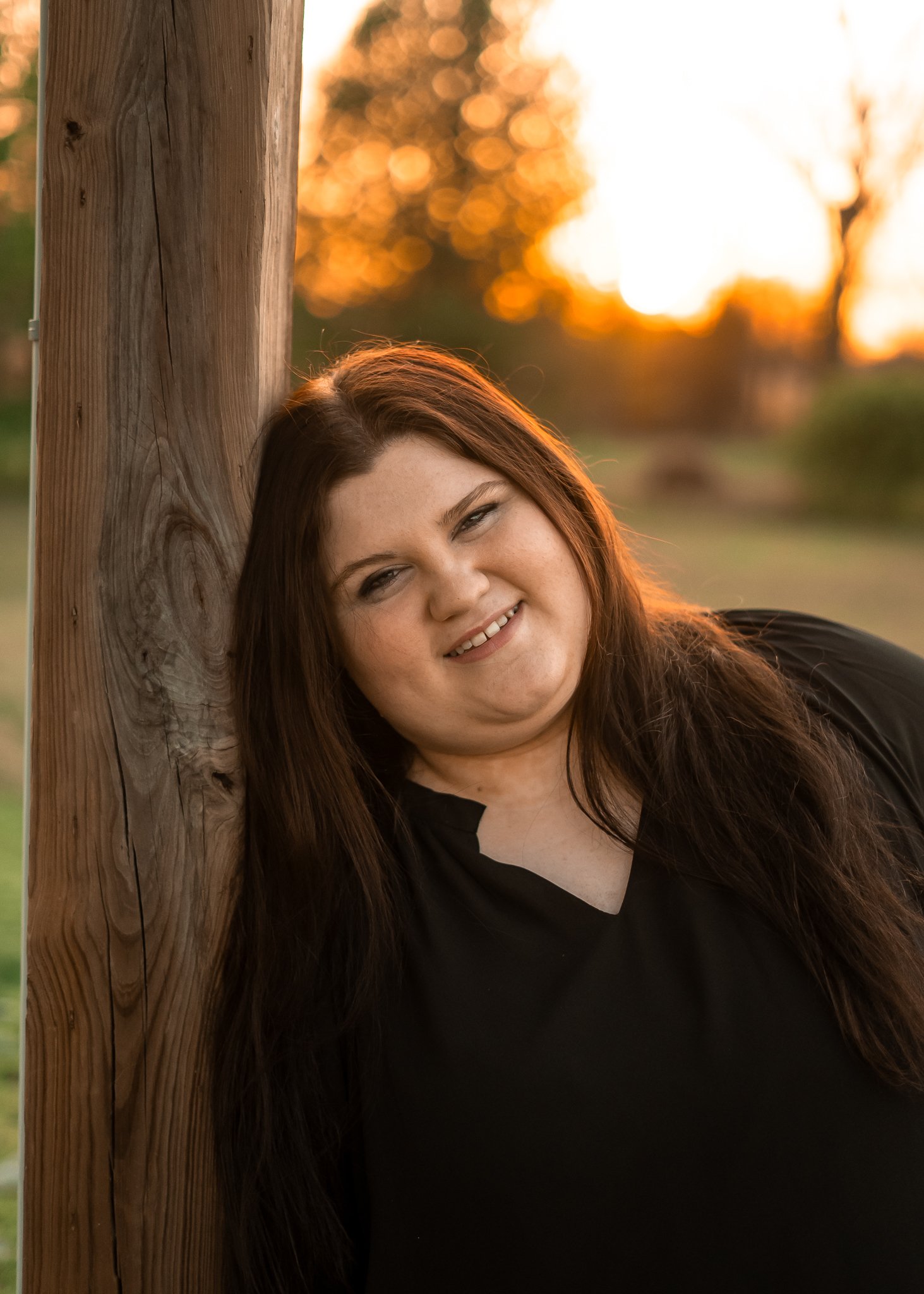  East Prairie Senior Portrait Session. Senior Photographer near Cape Girardeau Missouri. Golden Hour session with pond. Hobbies including four wheelers, fishing and drawing. Senior Session in Nature. Plus Sized Senior Portrait ideas. Poses for plus s