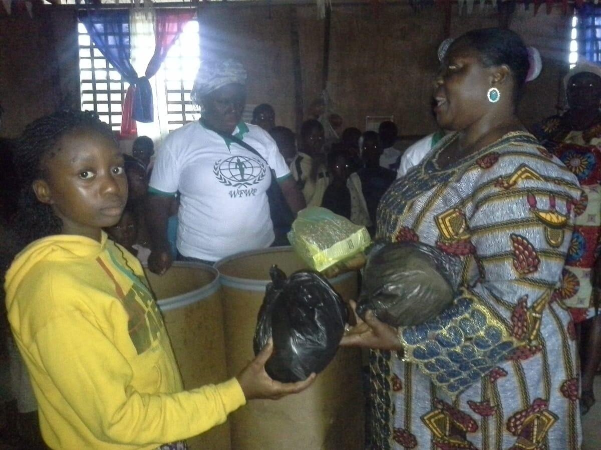 Orphans received their gifts from WFWP Liberia donated by WFWP USA