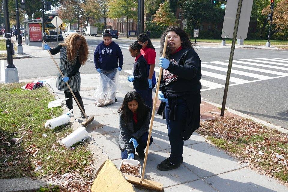 Students from Center City Public Charter School cleaning with Nandi Motom