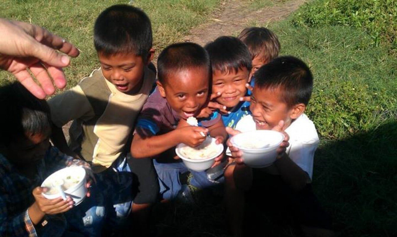 Kids were happy to get some warm food.