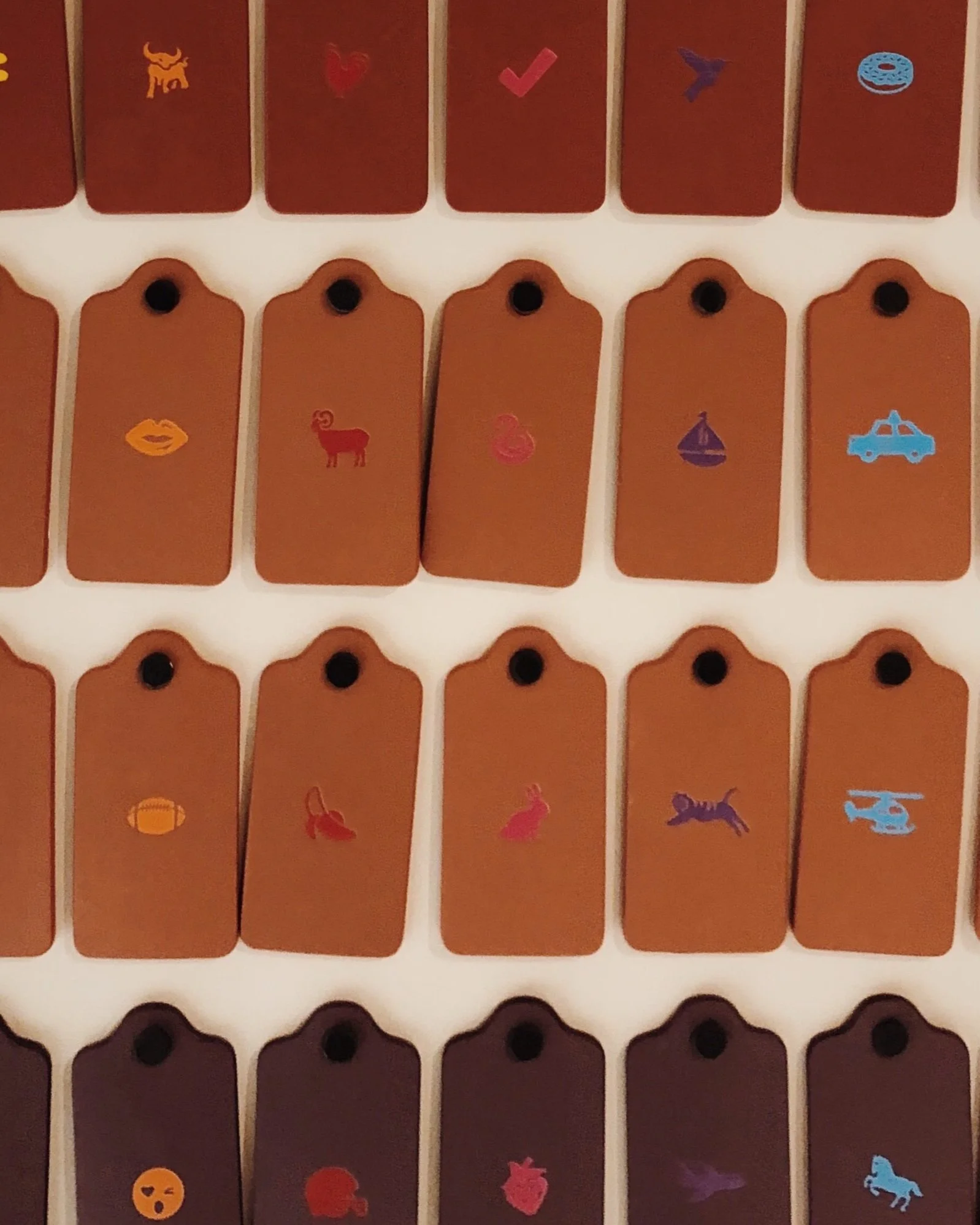 coach monogram tag