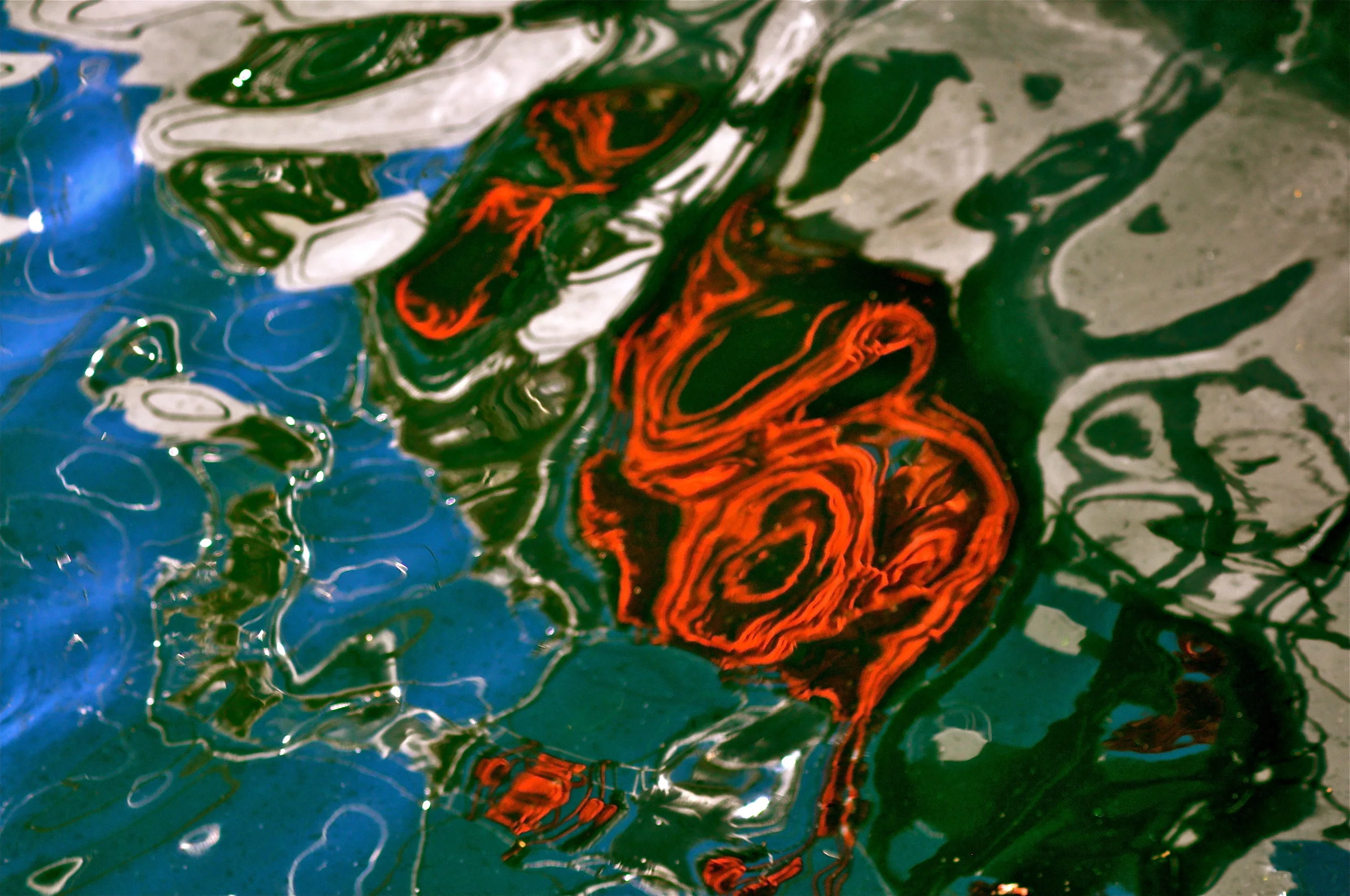 photo2 - oil on water patterns.JPG