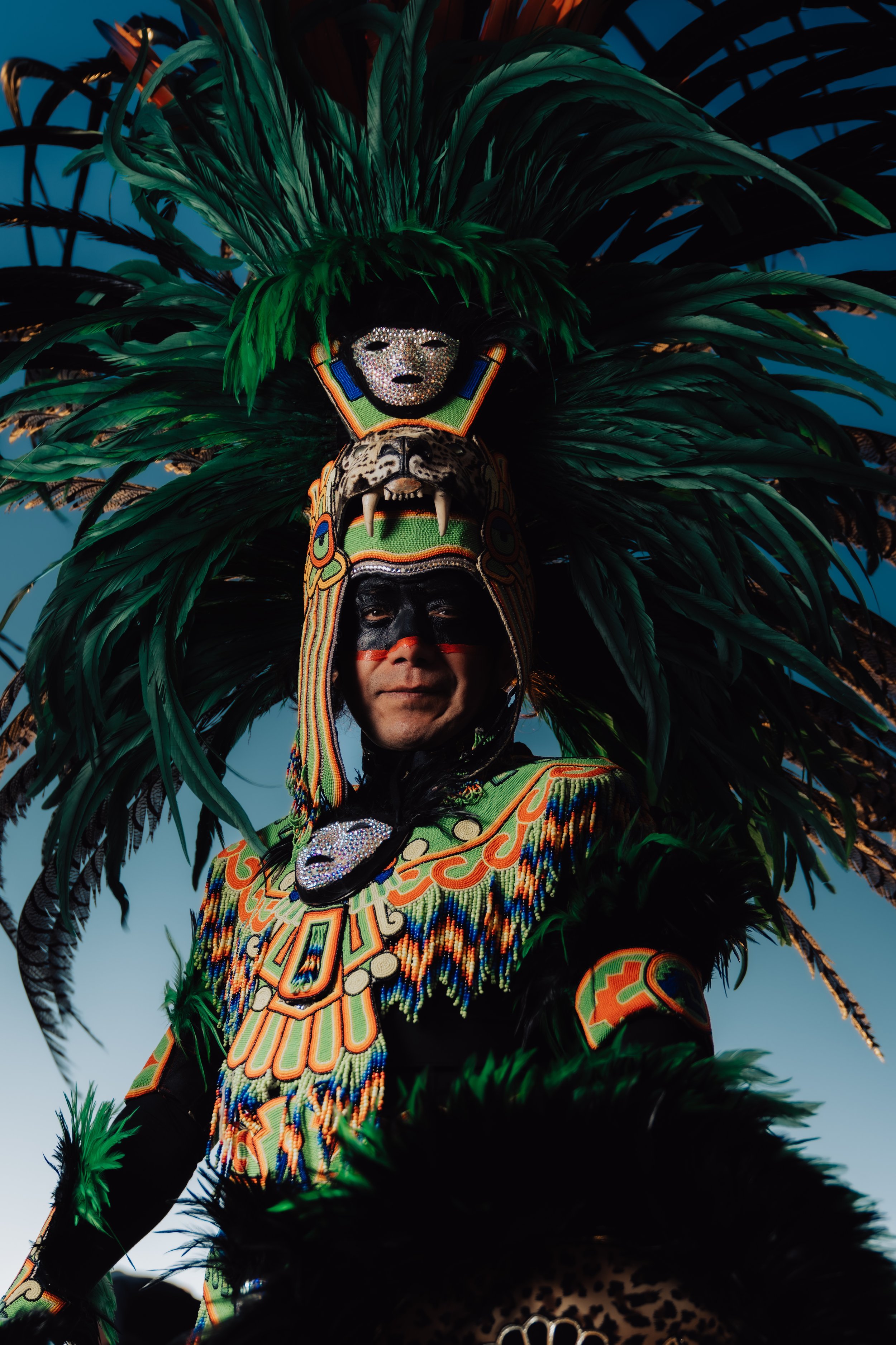 Lot #303 Alexa "LexMex" Treviño Existencia es Resistencia (2024) Archival photographic print on metal “As a portrait artist, I am deeply influenced by my cultural heritage and the rich traditions of my ancestors. This portrait was taken on Indig