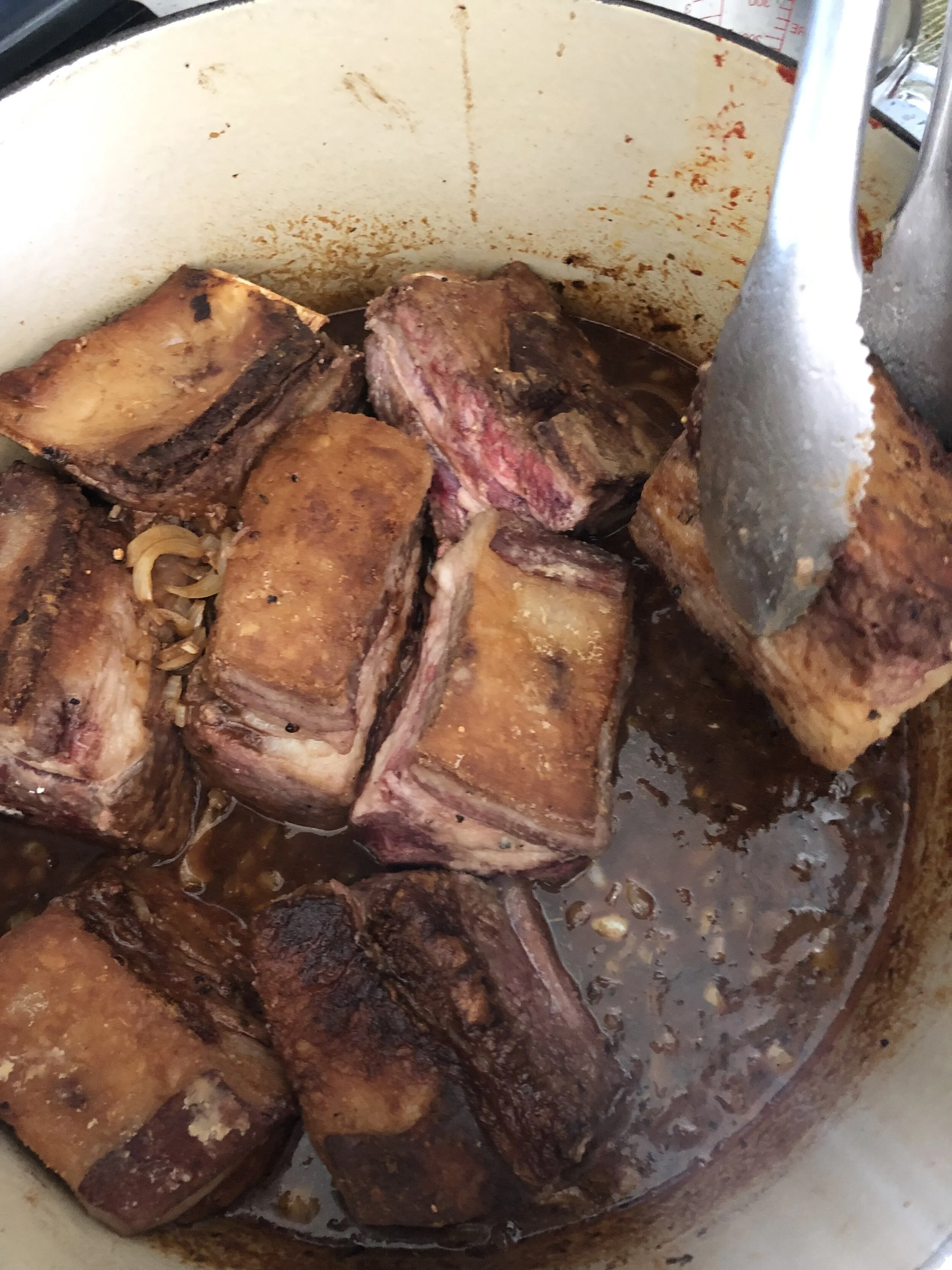 Add braising liquids and cook, covered, in the oven for 21/2 hours.