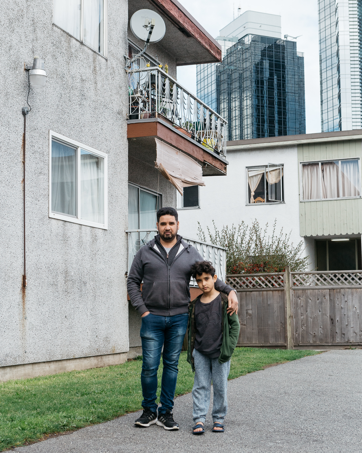   Dheyaa and his son:    How long have you lived in Metrotown?   Since 2014.   How does the housing crisis affect you?   We have mice and cockroaches in our suite and the building.   Did you receive any help or support to find alternate housing?   No