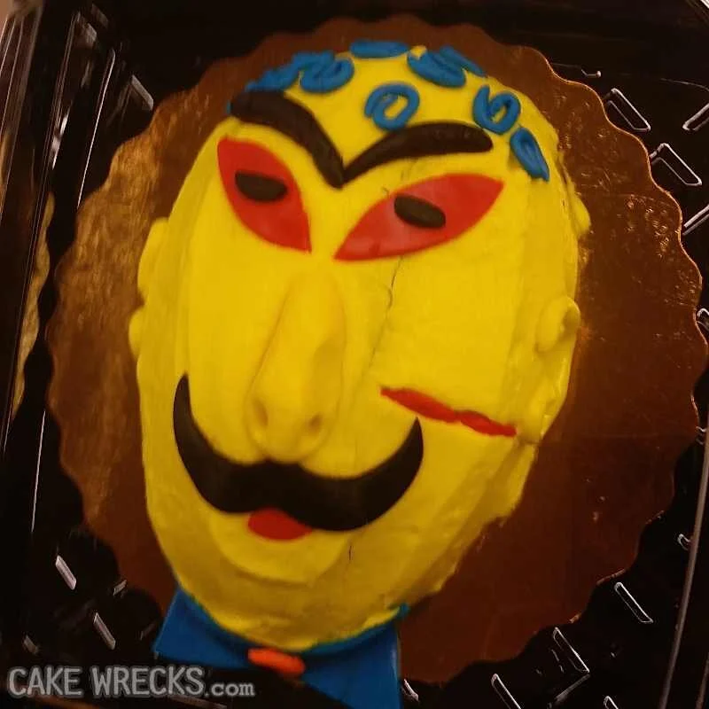 JennyEni.ow.creepyheadcake.jpg