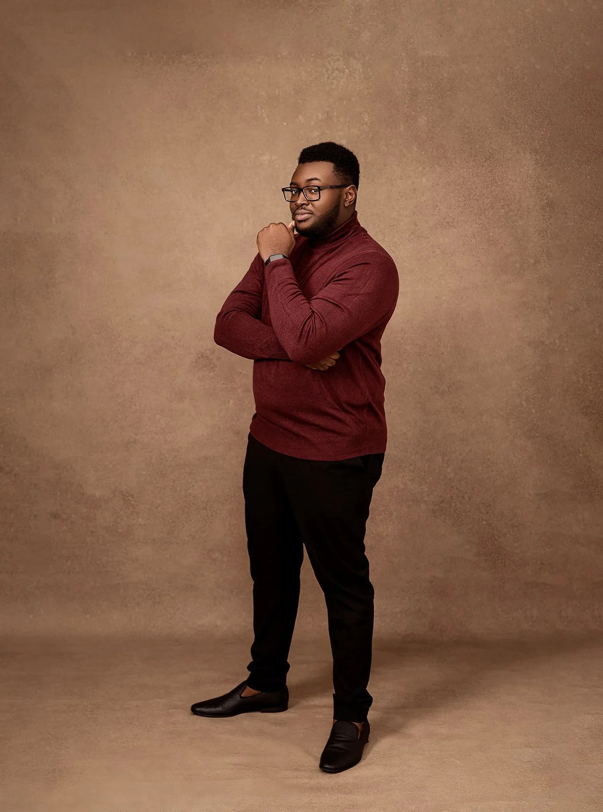 Full-length portrait of author Kevin Obike
