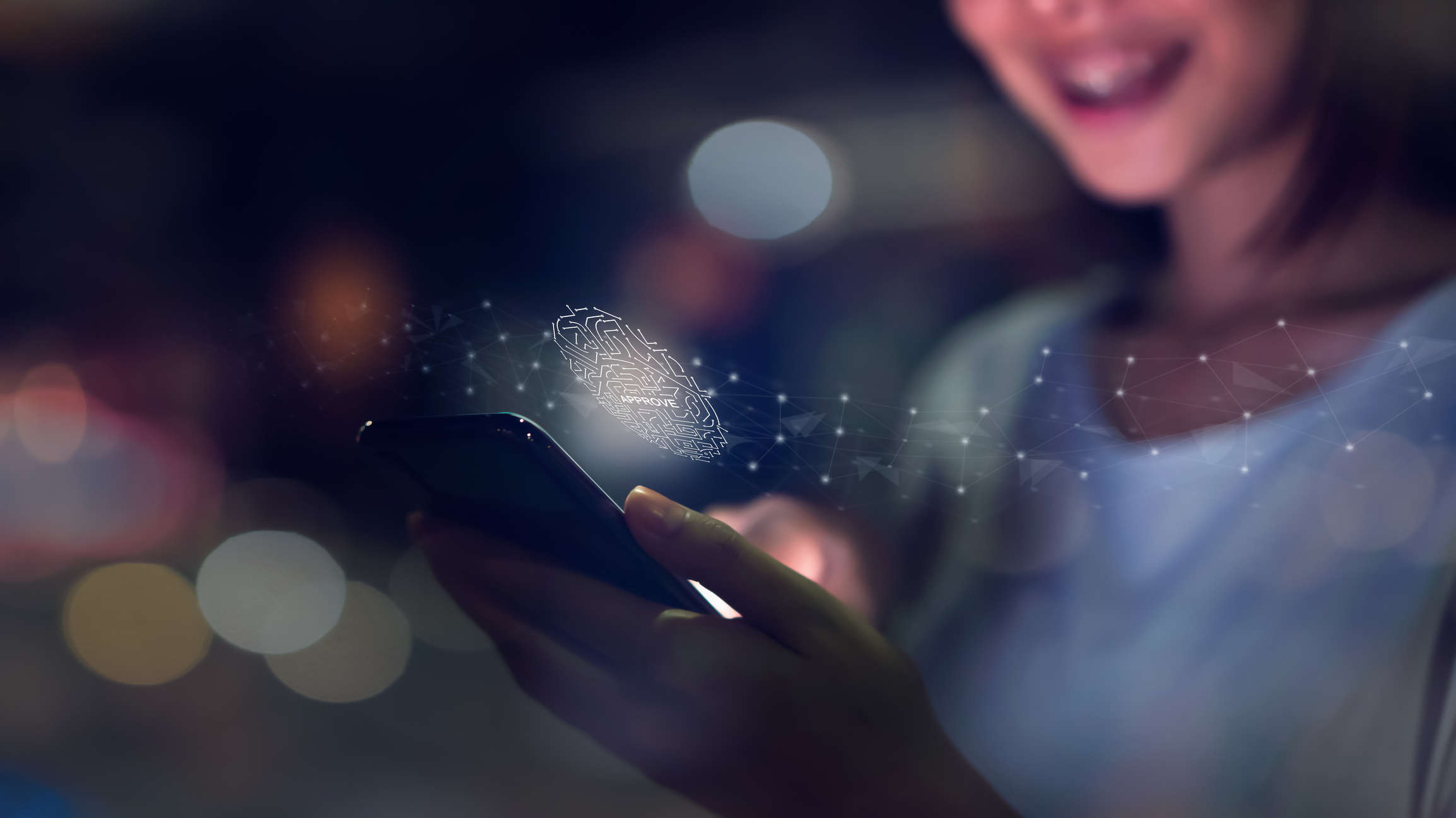 Woman's-hand-is-scanning-biometric-fingerprint-for-approval-to-access-smartphone.-Concept-of-the-danger-of-using-electronic-devices-is-important.-1073181480_2312x1300.jpeg
