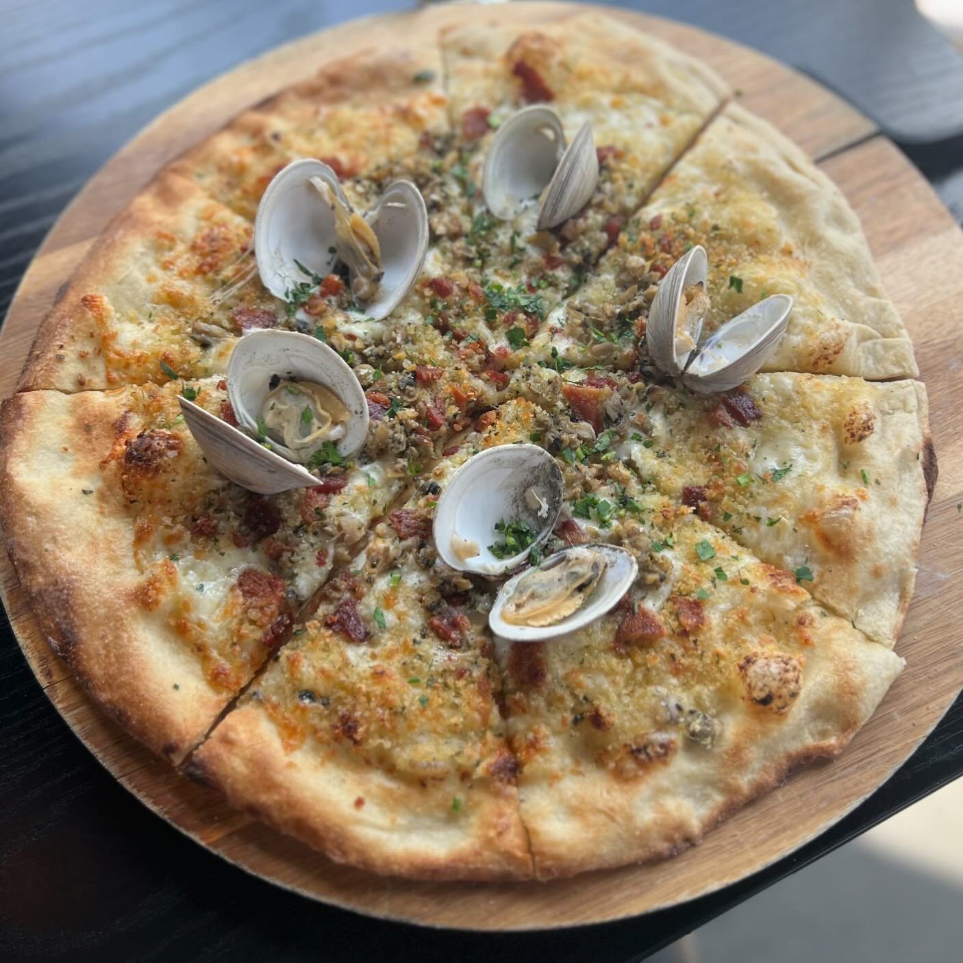 Just in time for the Spring warm up, our White Clam Pizza, with Littleneck Clams, Mozzarella, Breadcrumbs, and Garlic &amp; Shallot Oil.