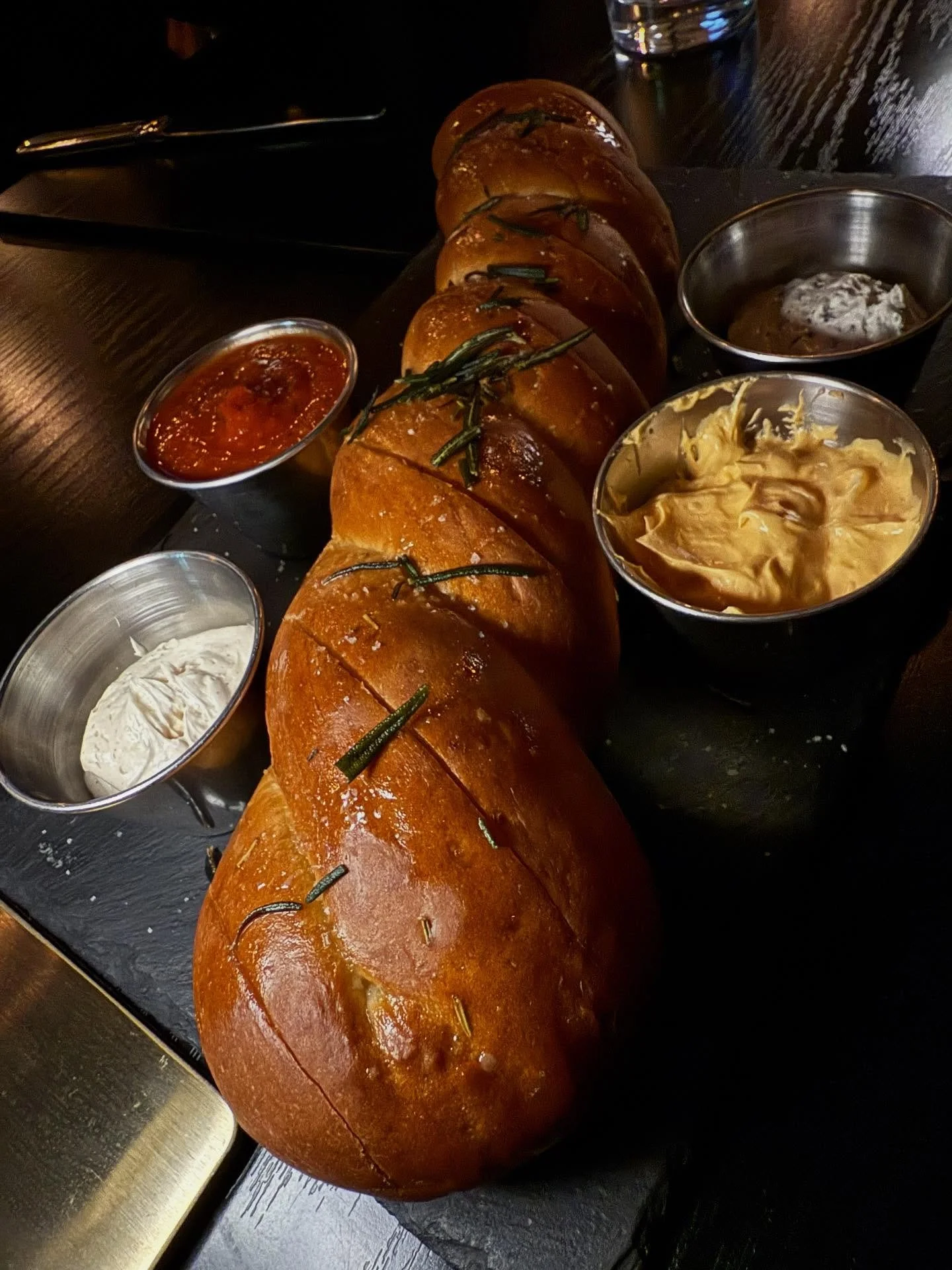 Brick Oven Rosemary Sourdough @ Locale! Served with our House Made Spreads - Garlic &amp; Herb, Brown Sugar &amp; Cinnamon, and Calabrian Chili, along with some of our famous Pomodoro!