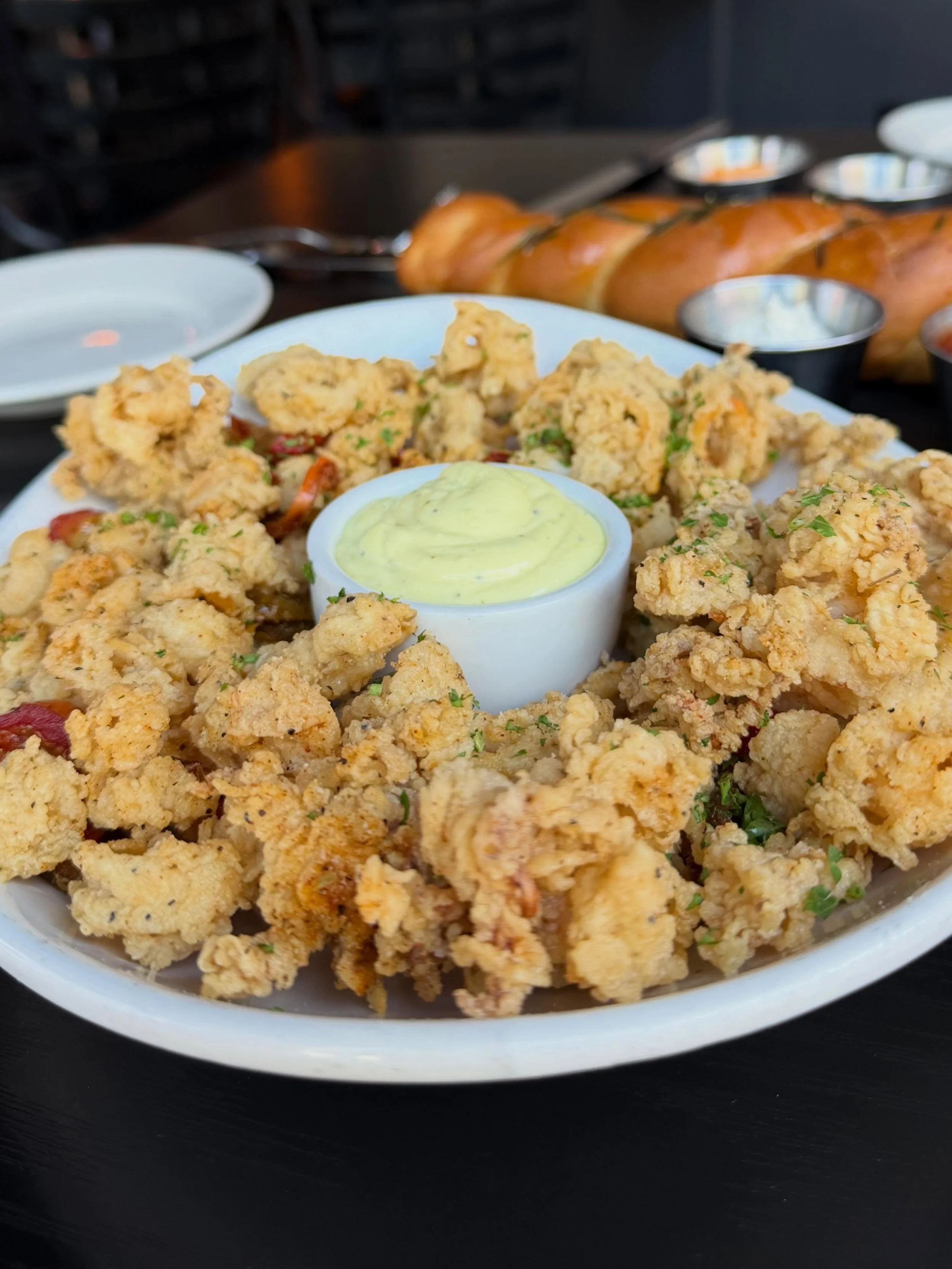 Crispy perfection from the heart of Las Vegas!
Tender rings of calamari, lightly fried to golden perfection at @localelv &mdash; served with zesty pickled cherry peppers and their house-made citrus aioli that&rsquo;s bright, creamy, and totally addic