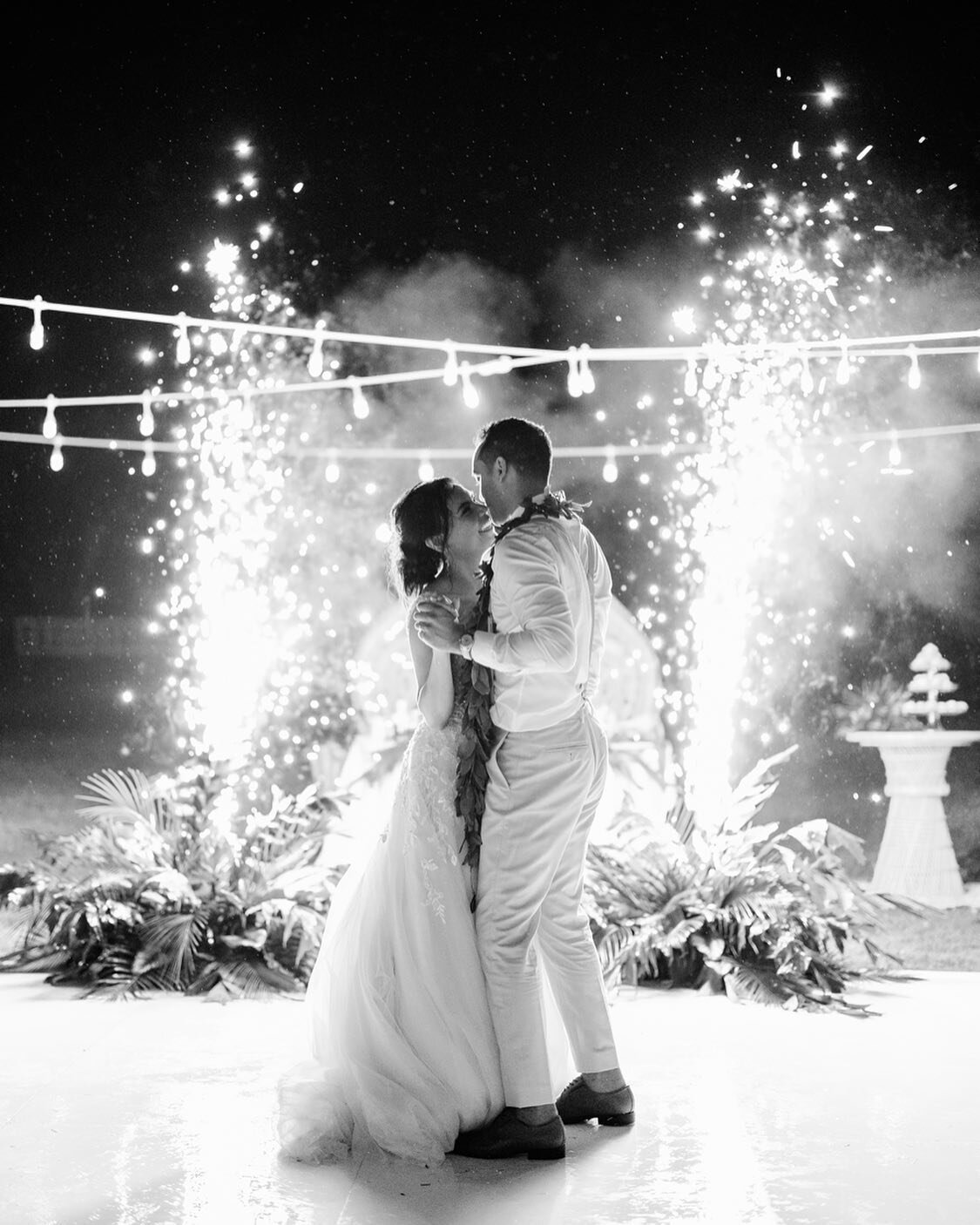 Something magical about those First Dance moments. I love the layers of textures here - the raindrops (yes it was drizzling!!), the cold sparks display, the hanging cafe lights, the greenery, their SMILES 😁

When the wait for your wedding is over 2 